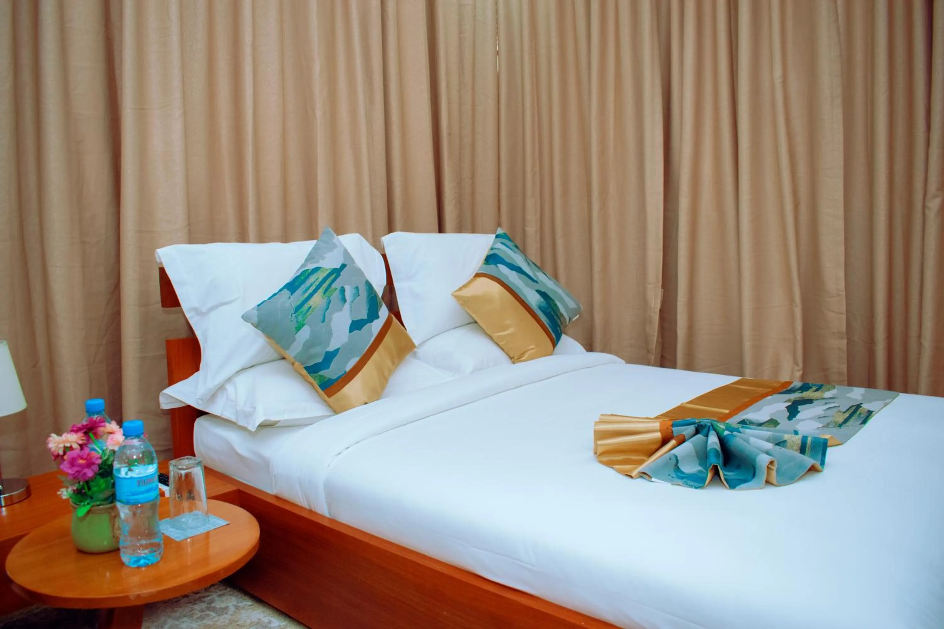 Bed in Inoga Luxury Hotel