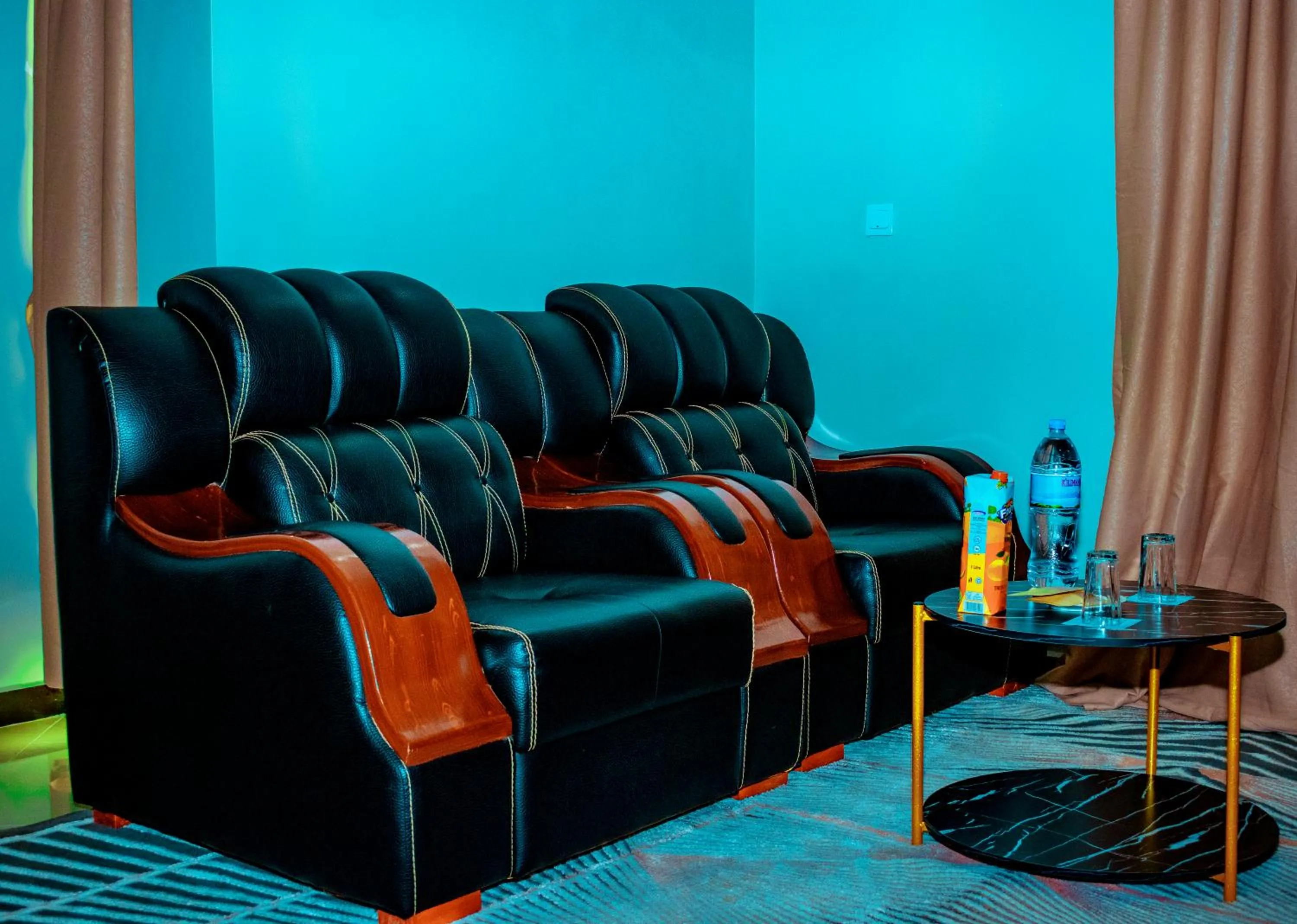 Seating area in Inoga Luxury Hotel