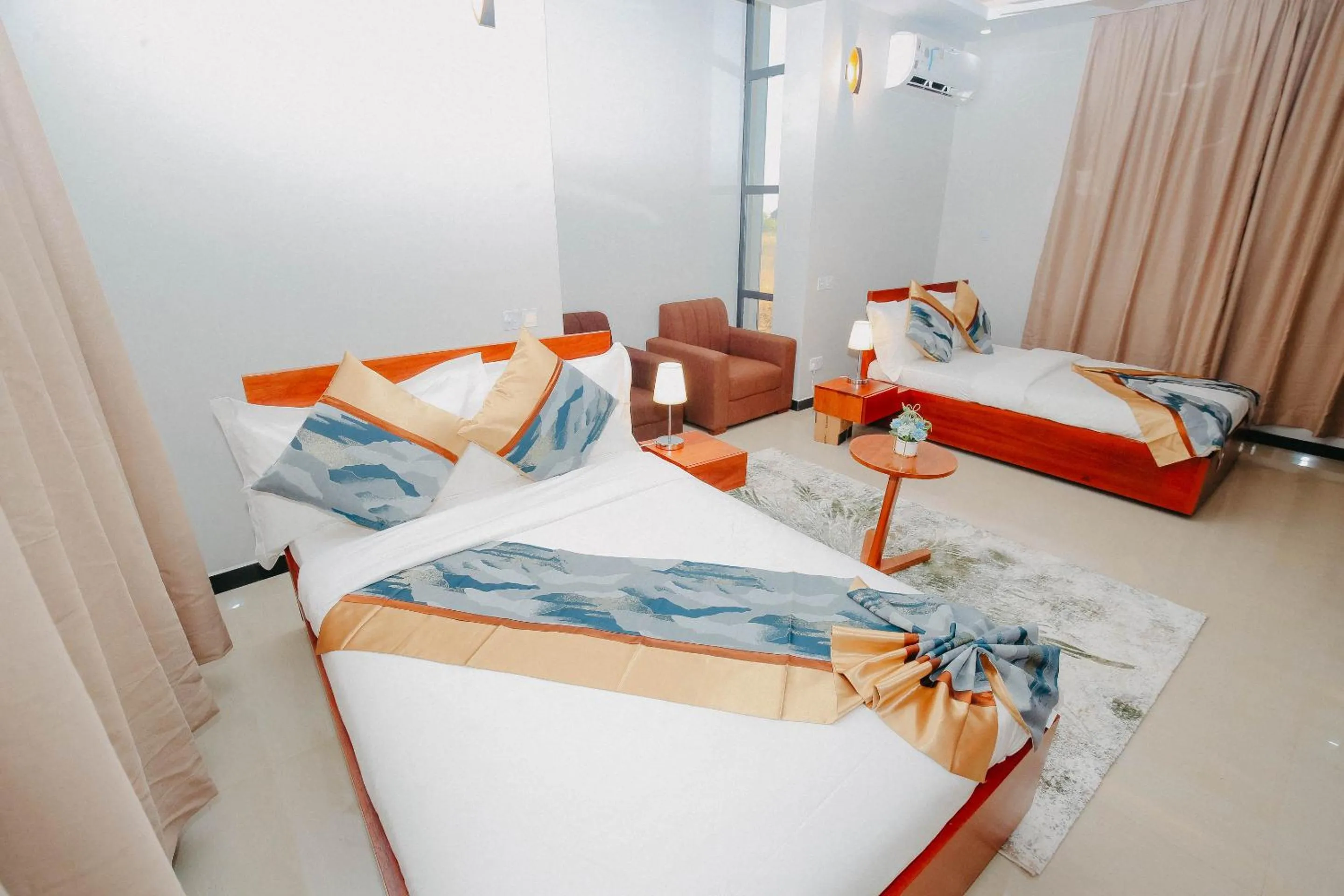 Bed in Inoga Luxury Hotel