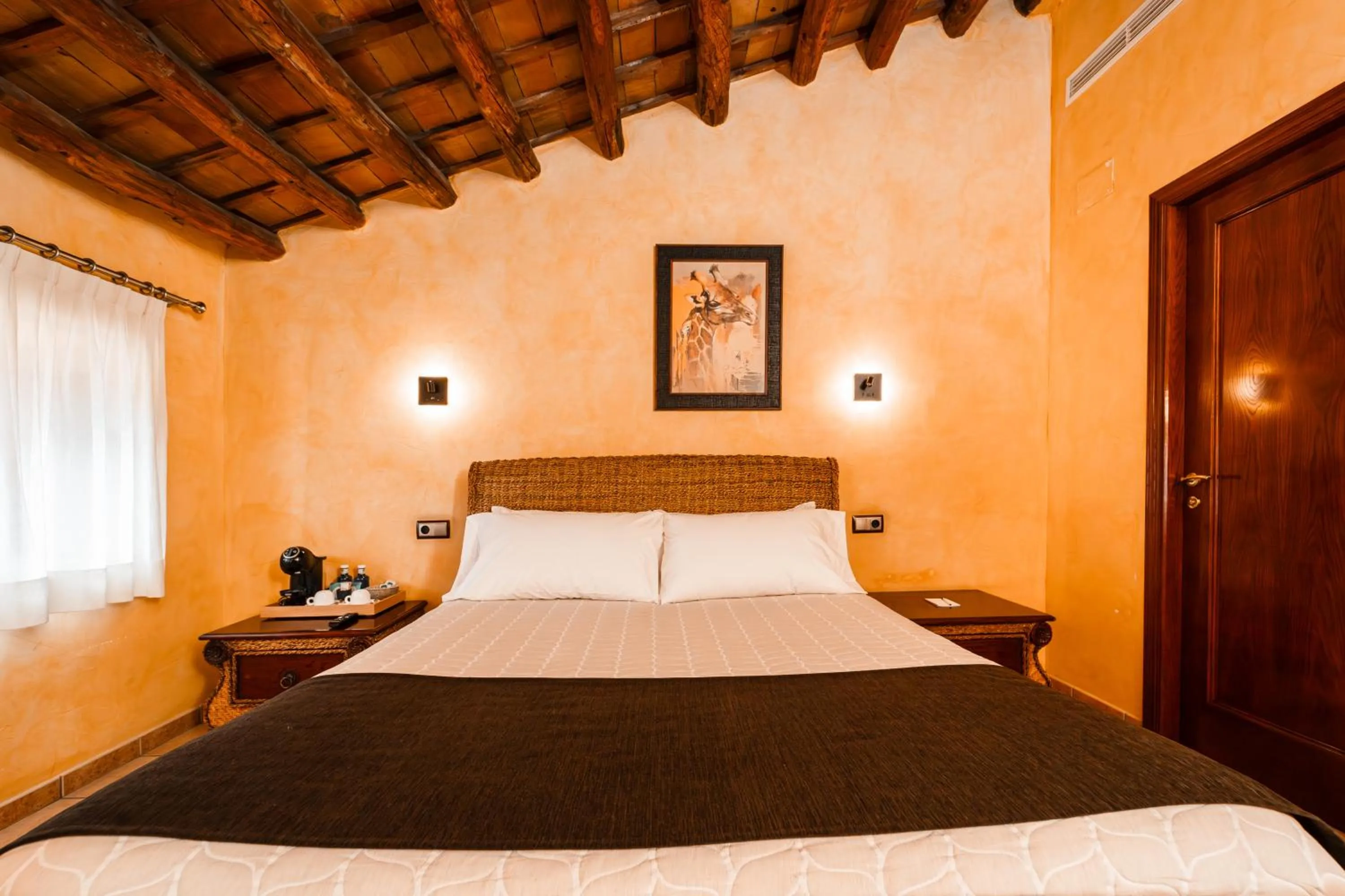 Bed in L'Agora Hotel