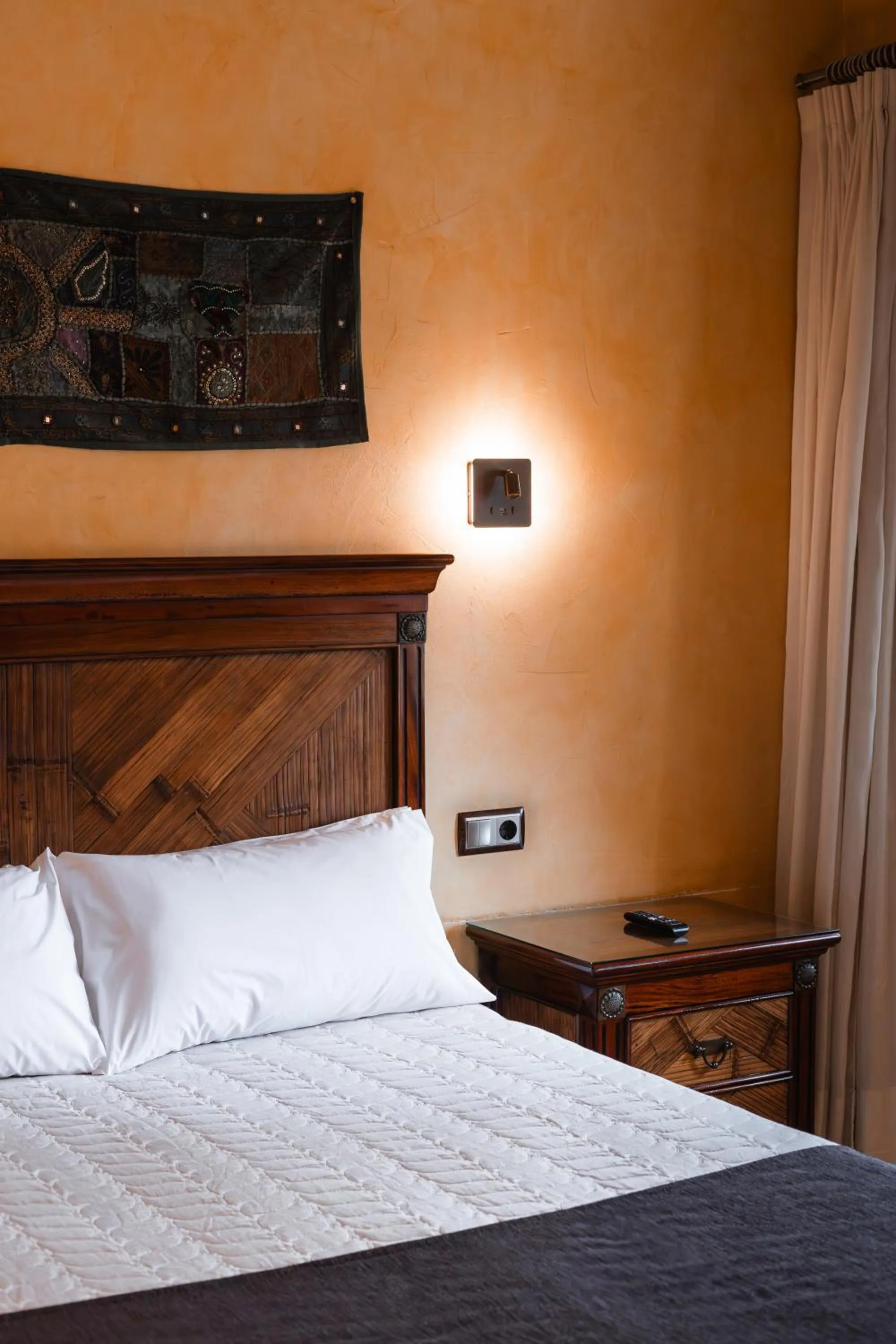 Bed in L'Agora Hotel