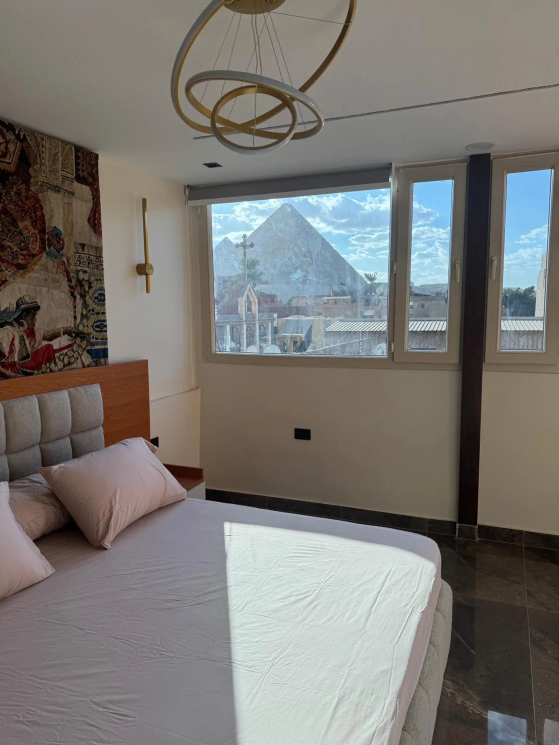 Bed in Osiris pyramids view inn