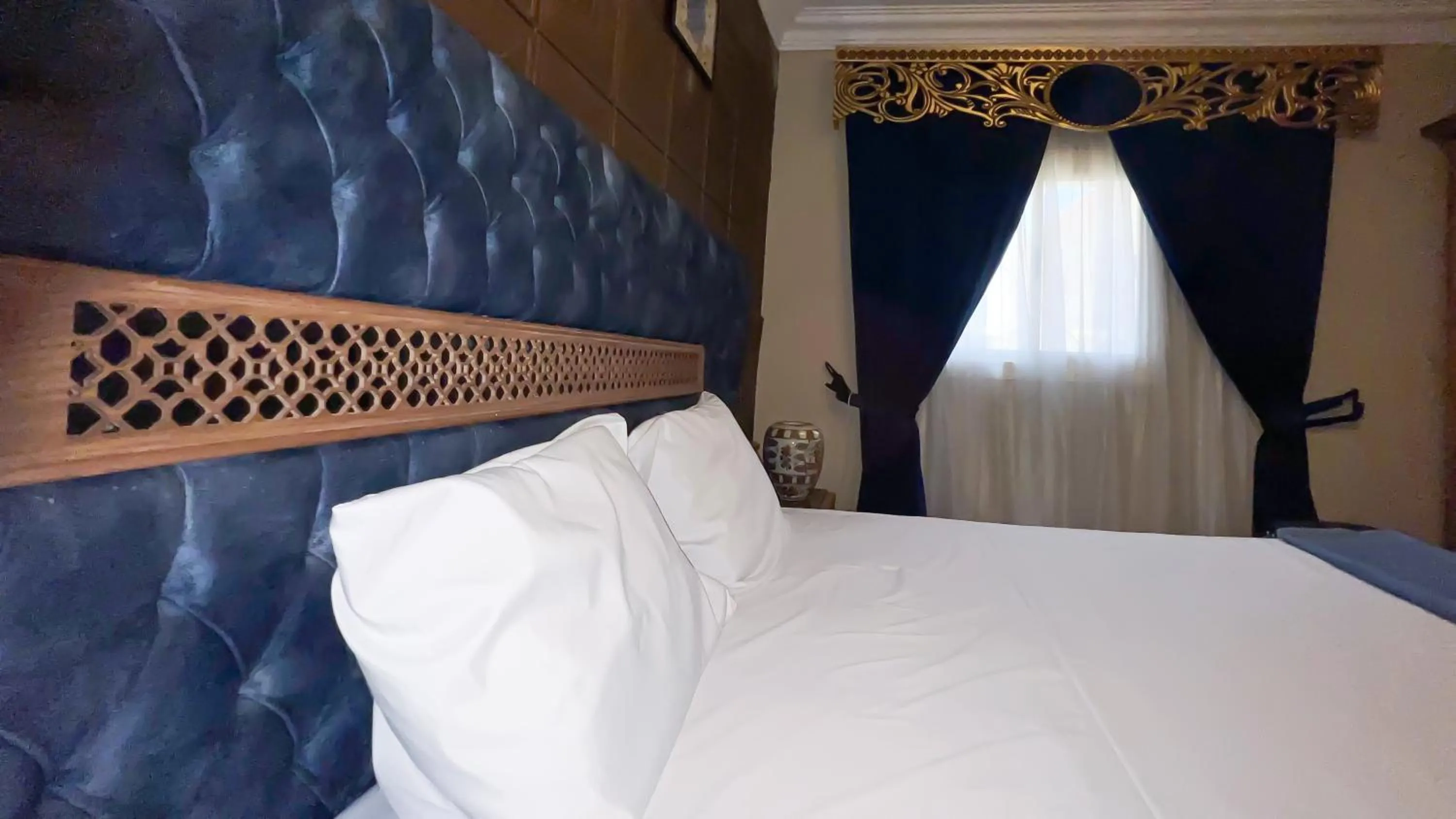 Bed in Osiris pyramids view inn