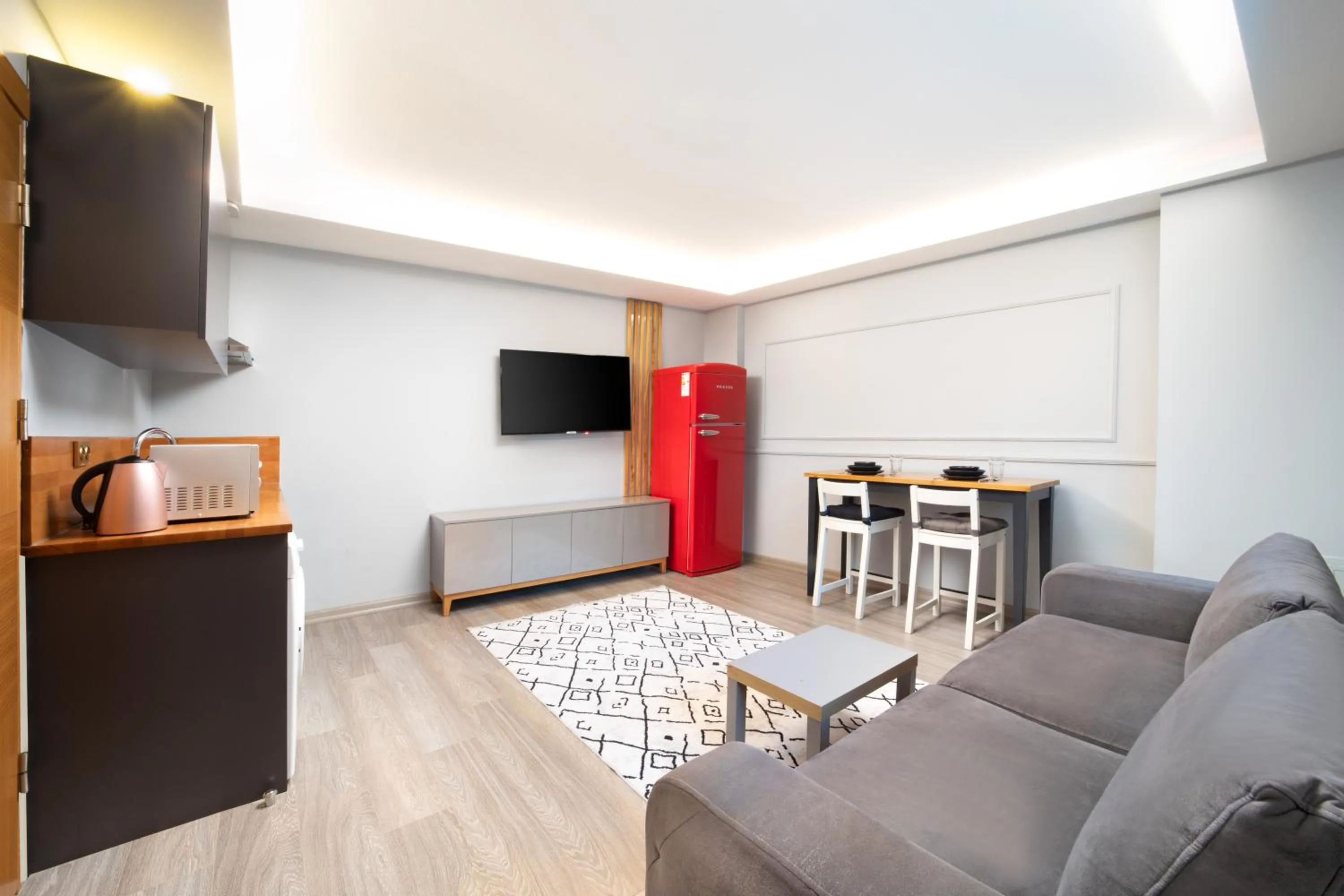 Communal lounge/ TV room in Park Çağlayan Hotel