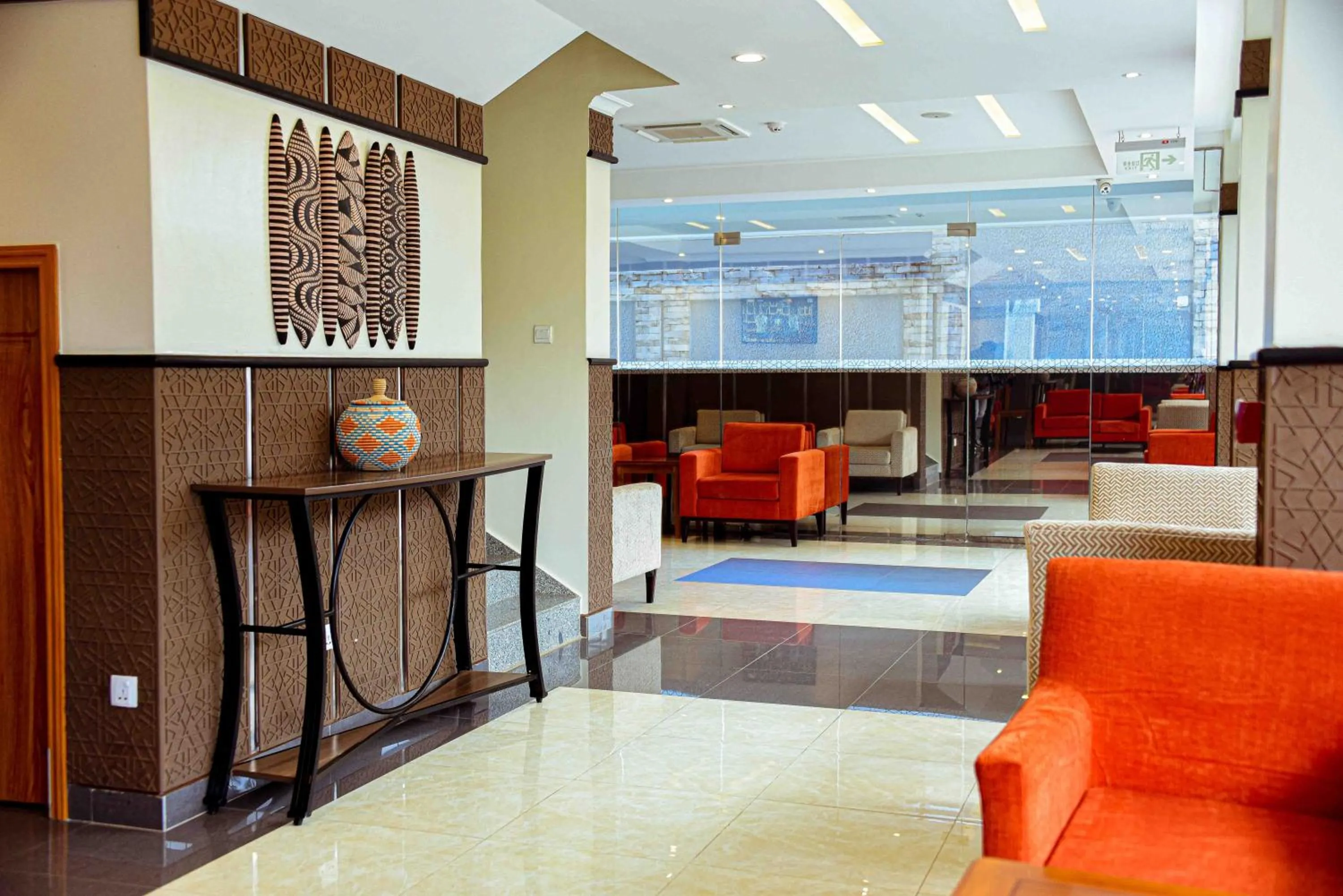 Communal lounge/ TV room in Urban Park Suites Hotel