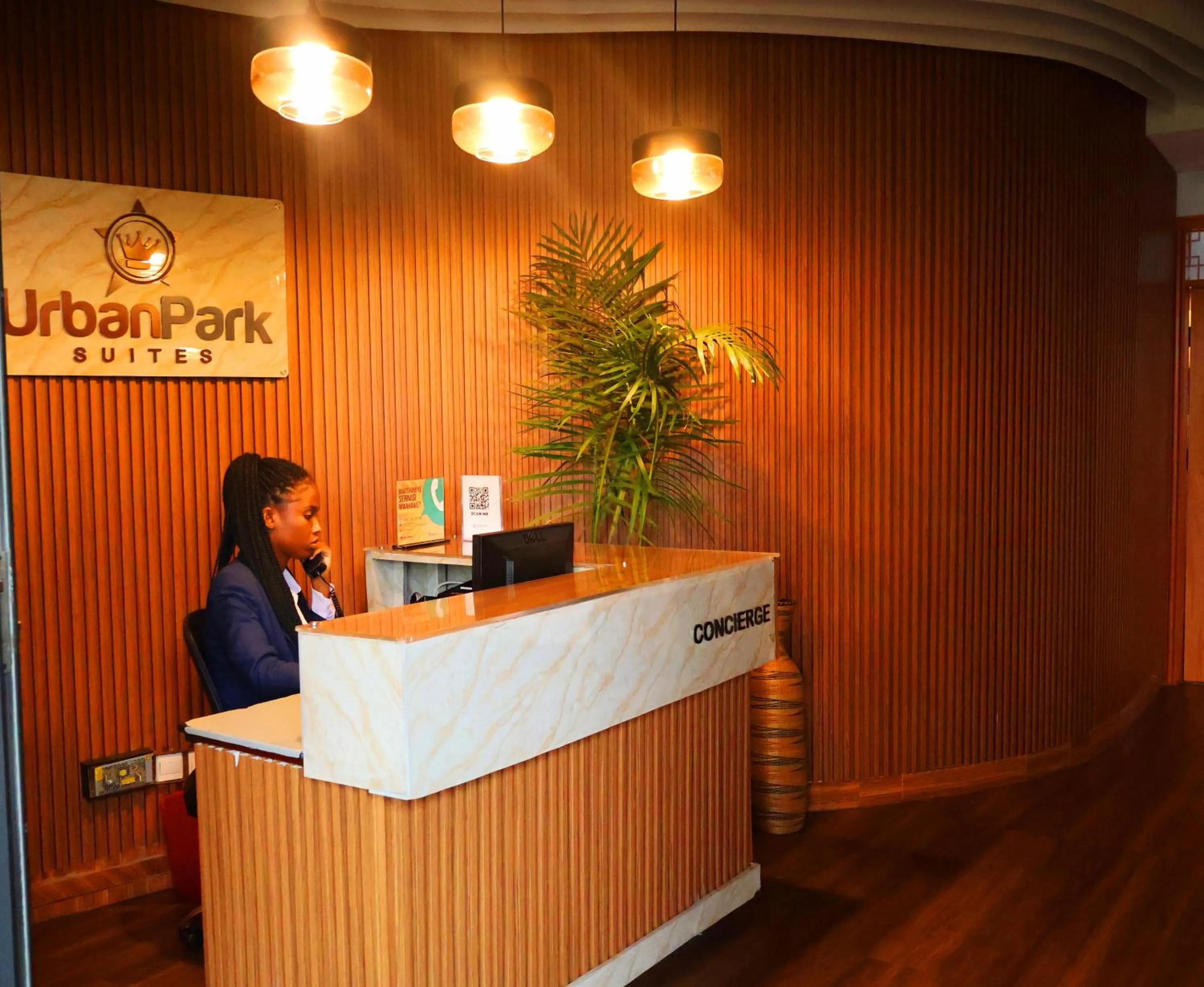 concierge in Urban Park Suites Hotel