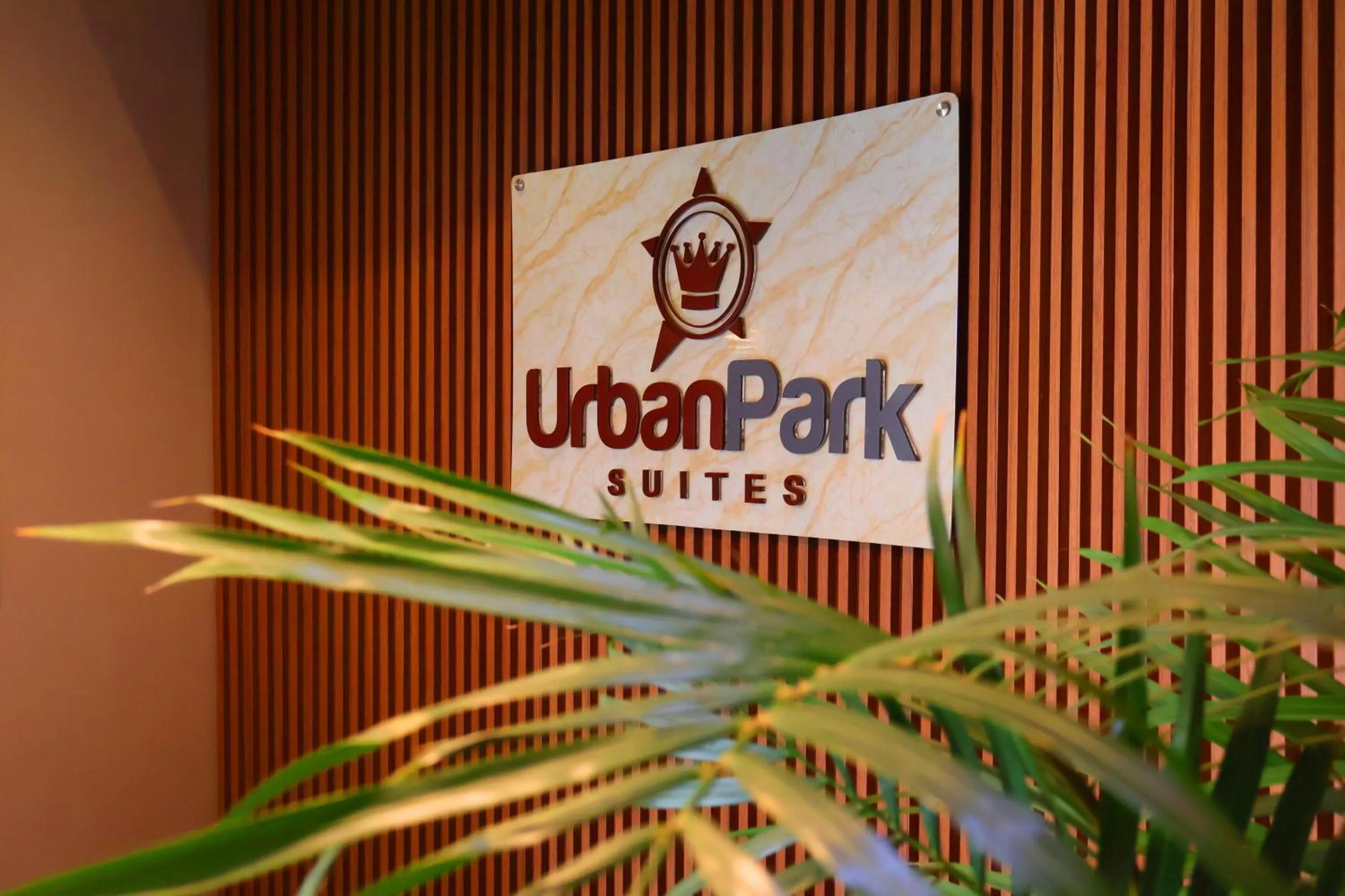 Property logo or sign in Urban Park Suites Hotel