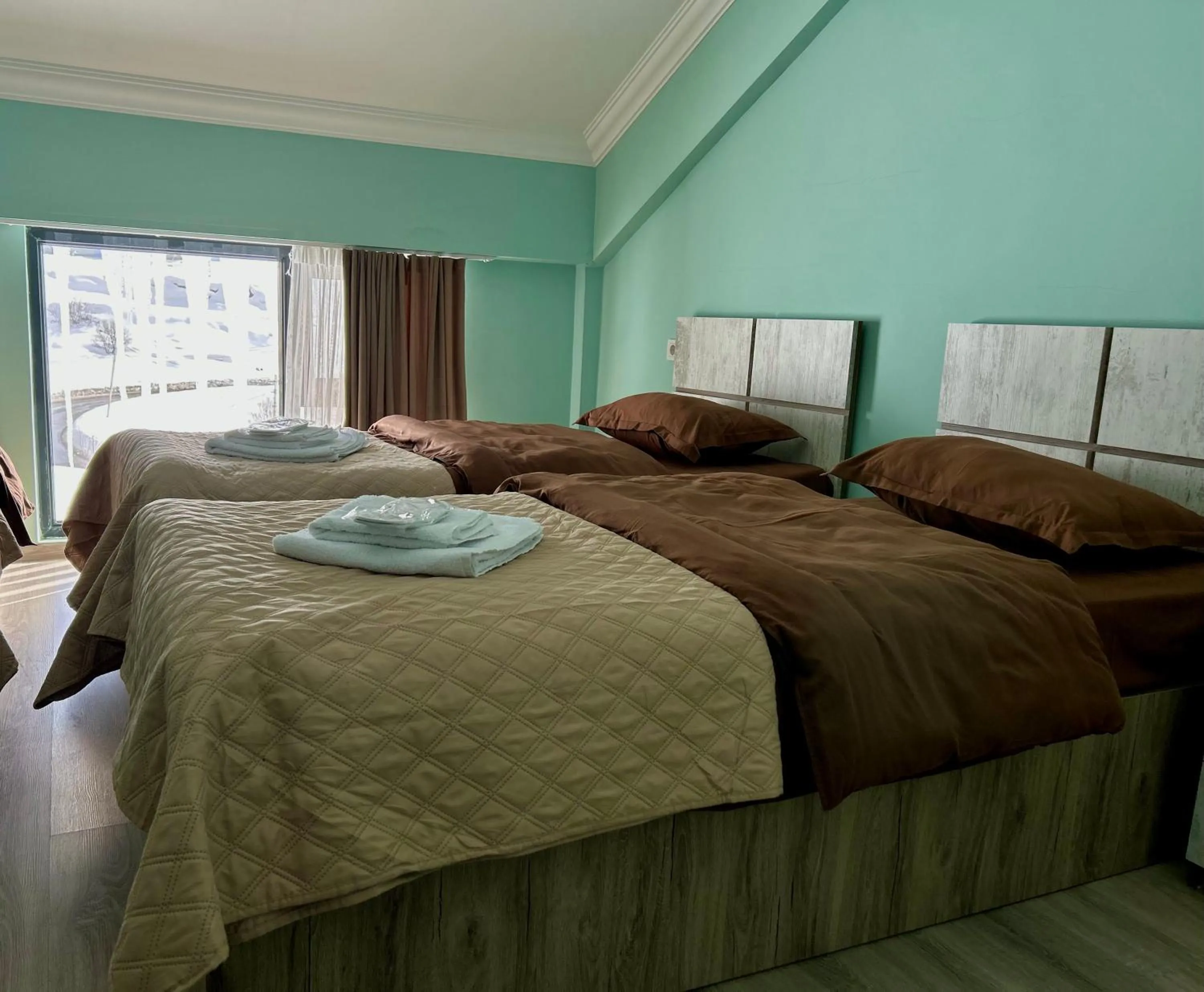 Bed in Dandelion Hotel Gudauri