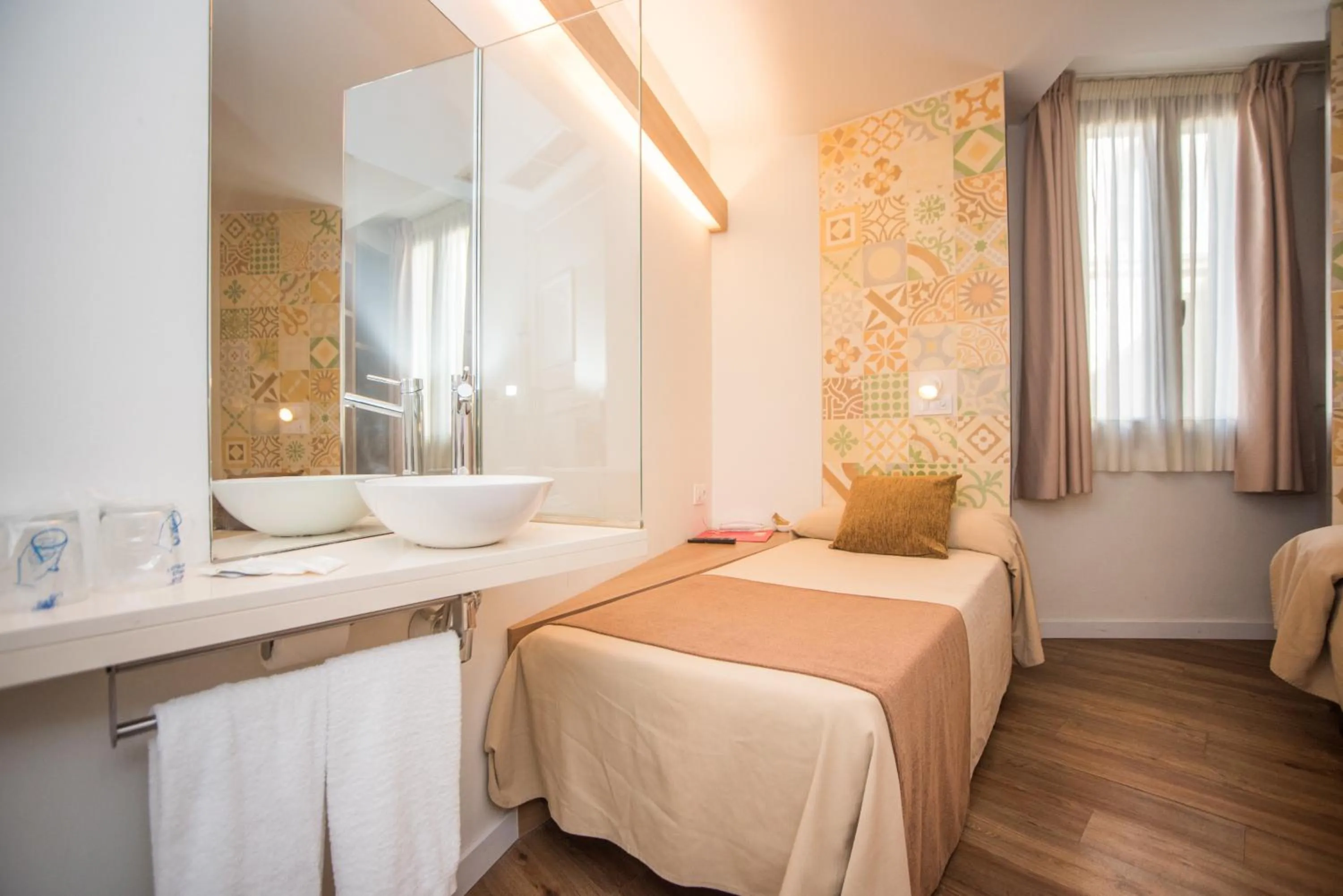 Decorative detail, Bed in Hostal Marenostrum