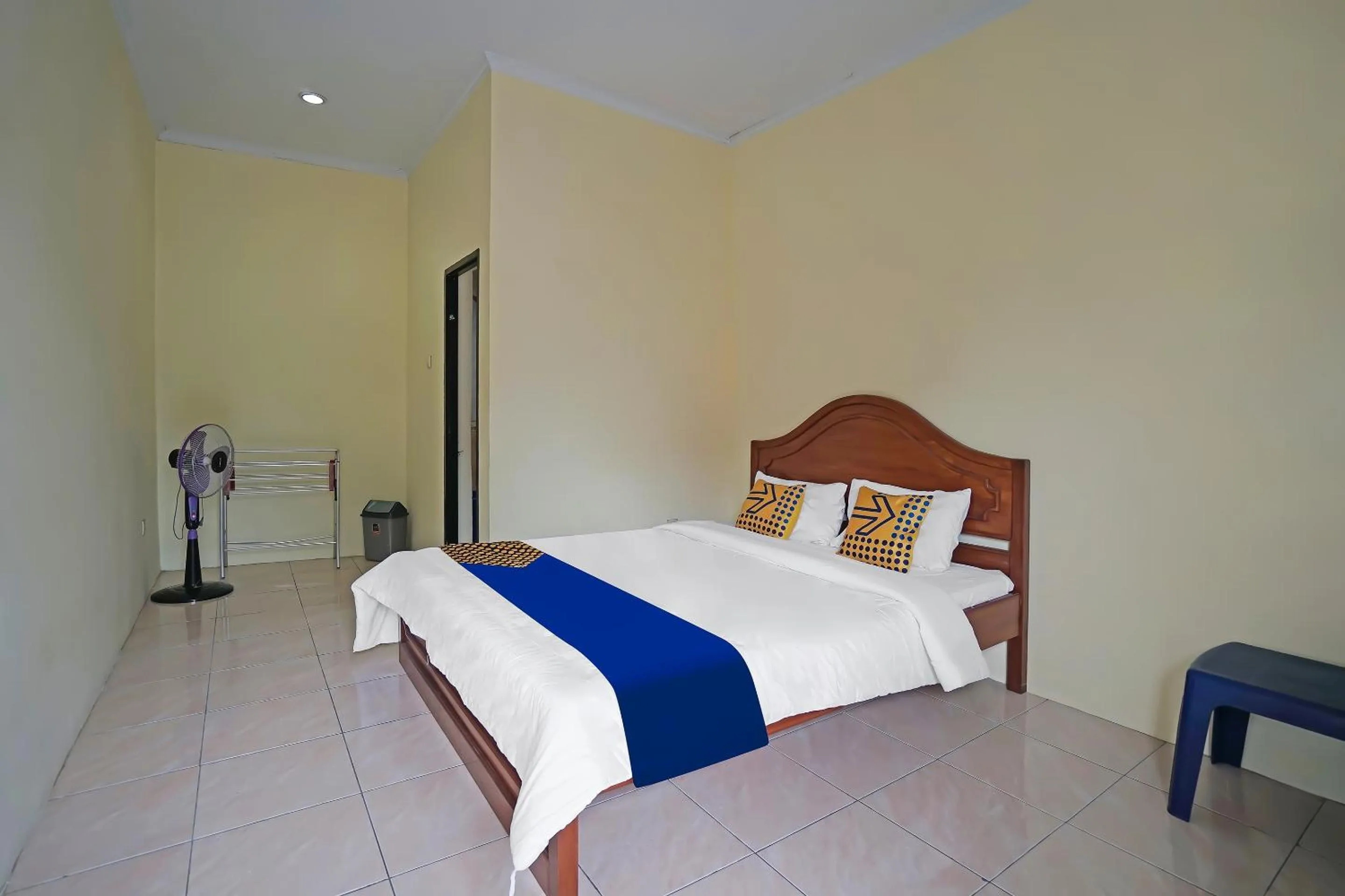 Bedroom in Hotel O Arfan HouseNearDanau Ranau