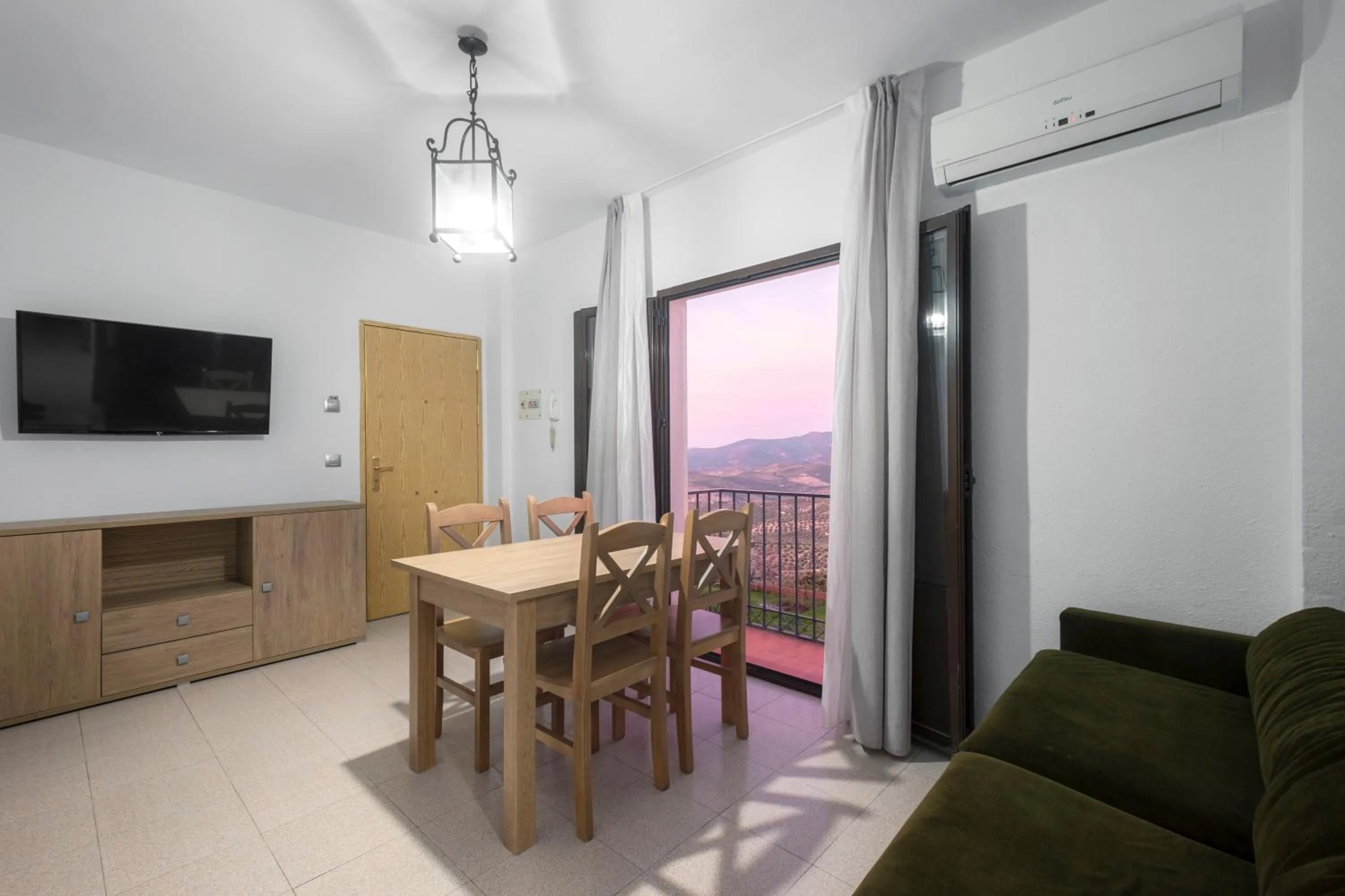 Communal lounge/ TV room in Apartamentos San Pedro