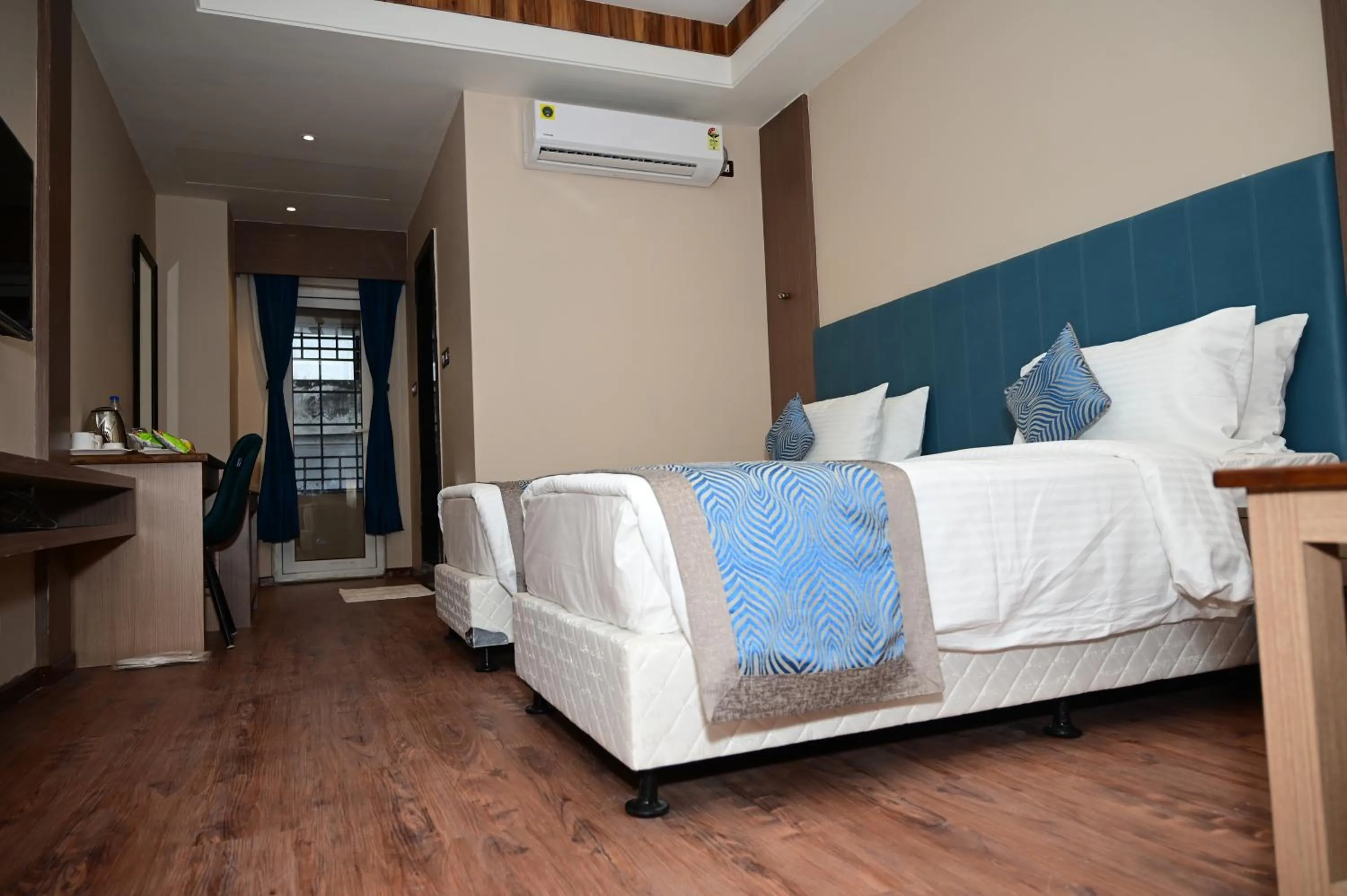 Photo of the whole room, Bed in PIPUL PADMAJA PRIDE