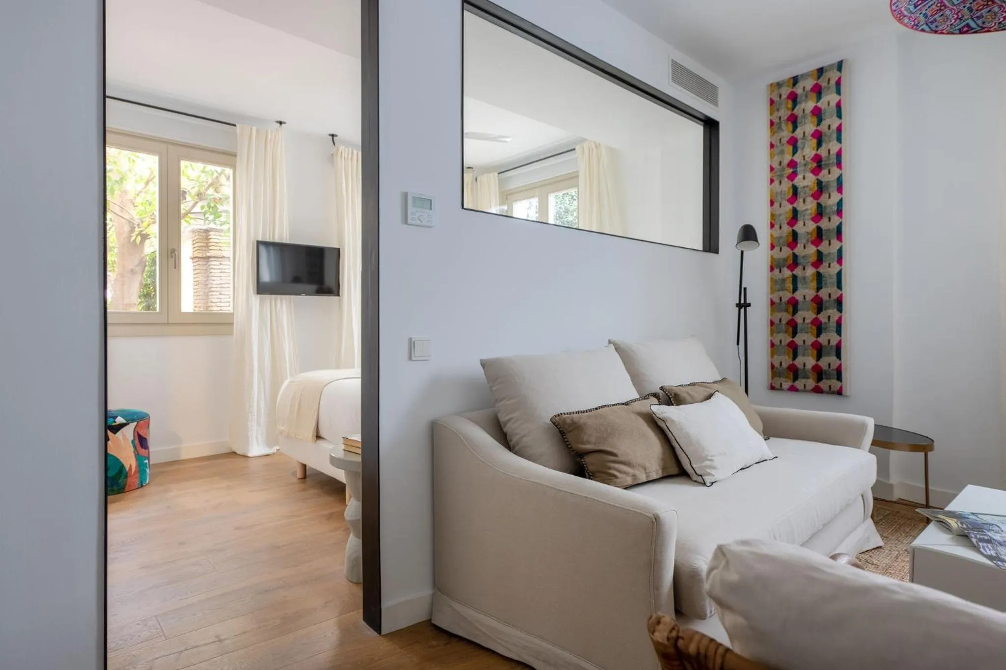 Communal lounge/ TV room in Tetuán 15 Boutique Apartments by Hommyhome