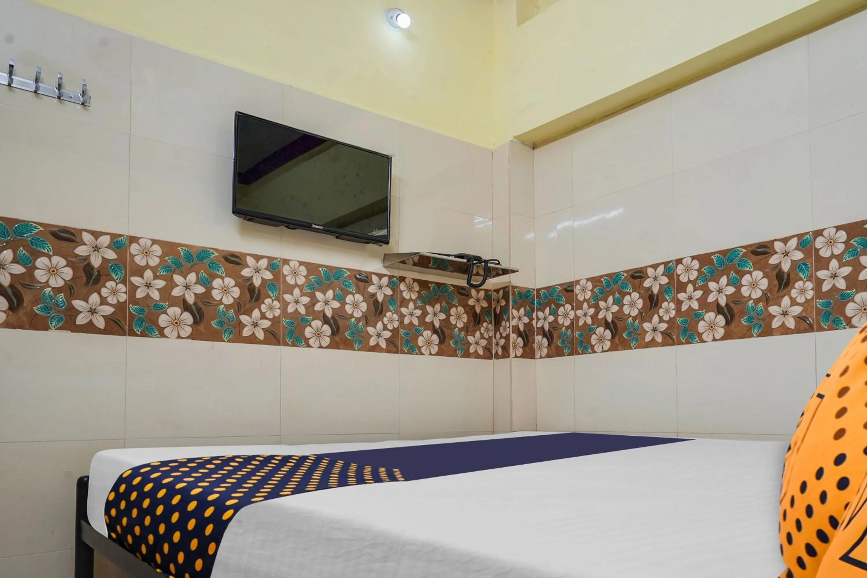 Bedroom in SPOT ON New ROYAL LODGE