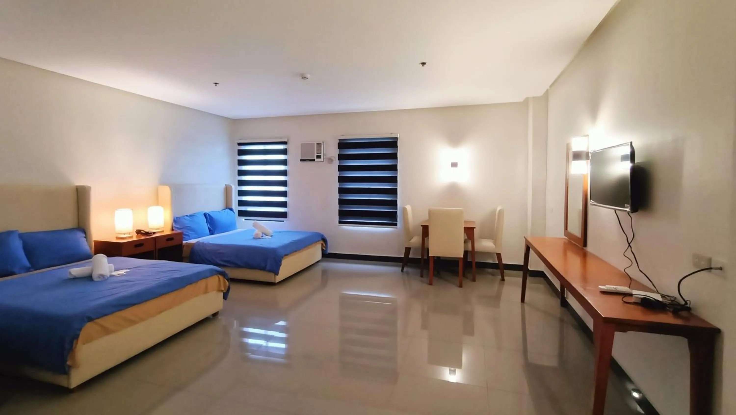 Bed in Grand Emilia Hotel