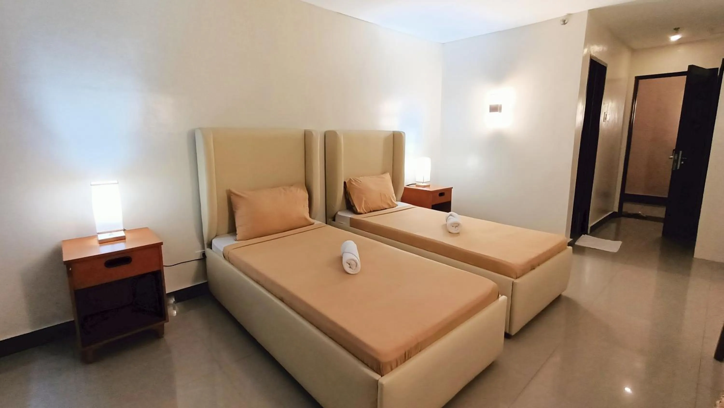 Bed in Grand Emilia Hotel