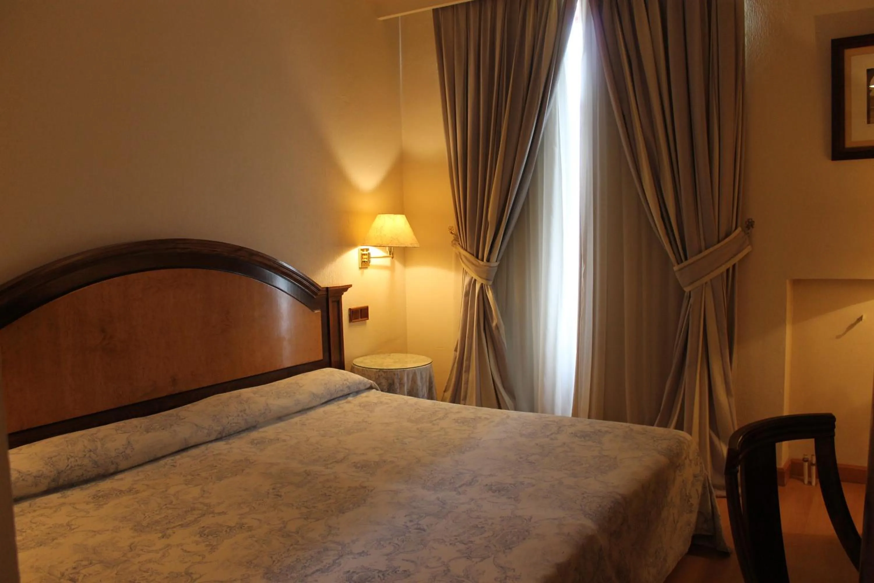 Bed in Hotel Monterrey