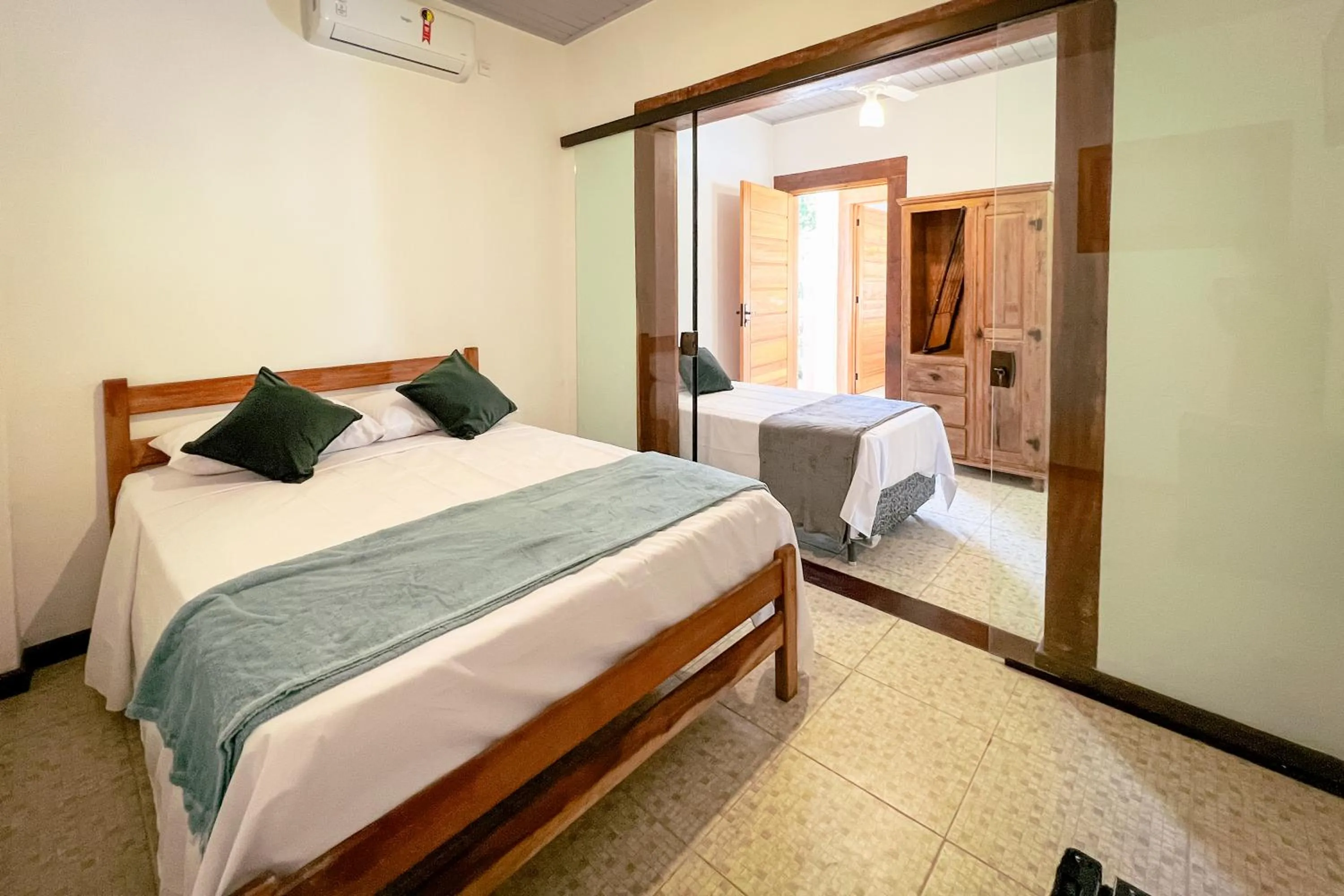 Bed in VELINN Pousada Canoa Ilhabela