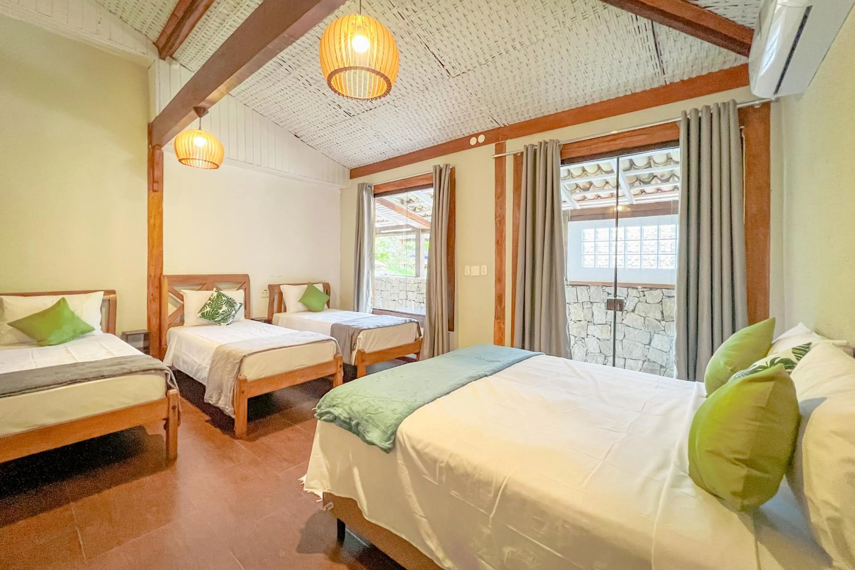 Bed in VELINN Pousada Canoa Ilhabela