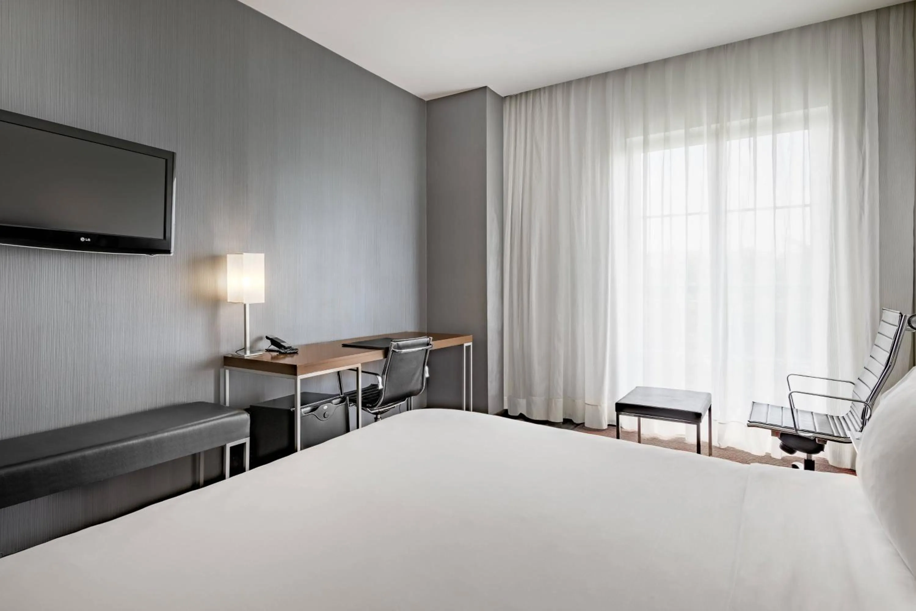 Photo of the whole room, Bed in AC Hotel Burgos by Marriott