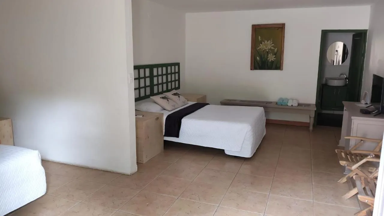 Bedroom, Bed in Finca Hotel Guadalupe