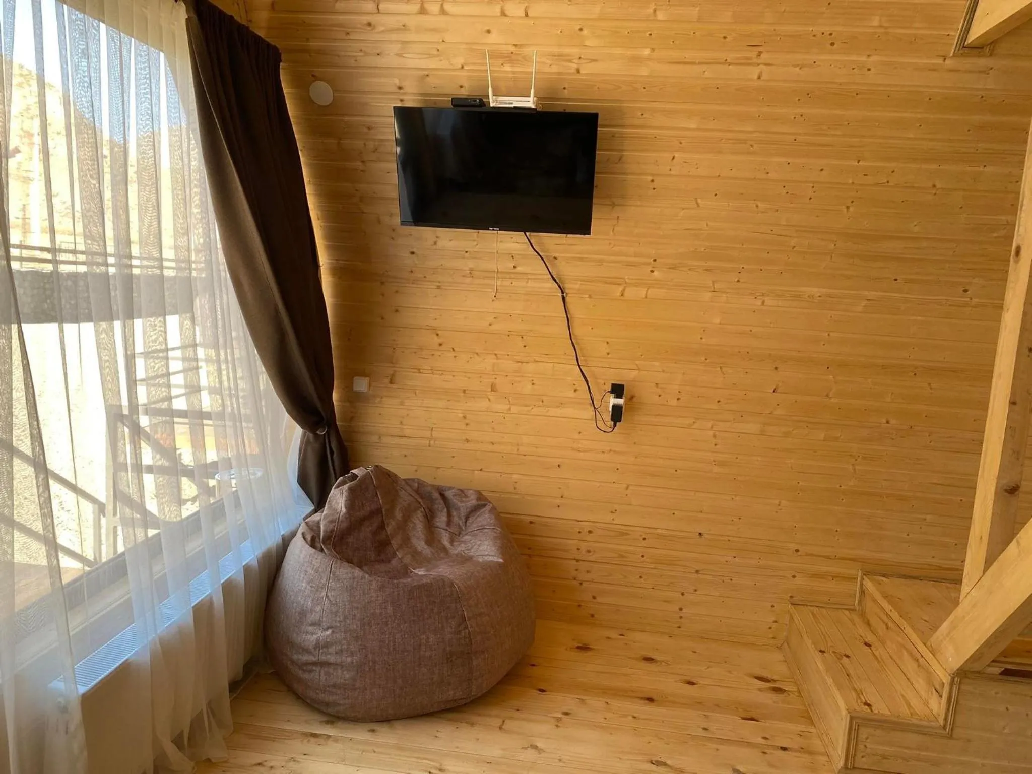 Communal lounge/ TV room in Cottages LIZA