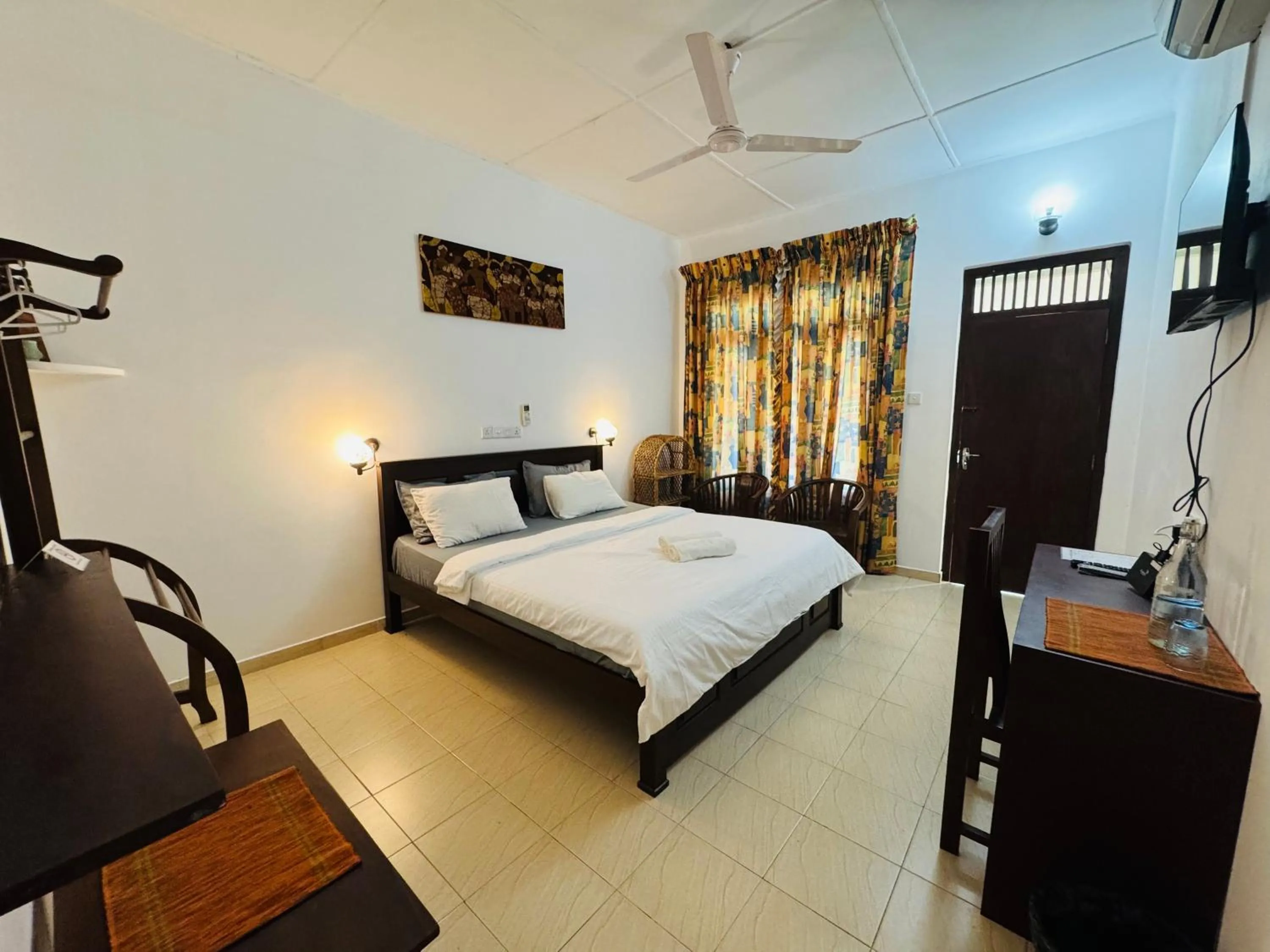 Bed in Shanthi Boutique Villa