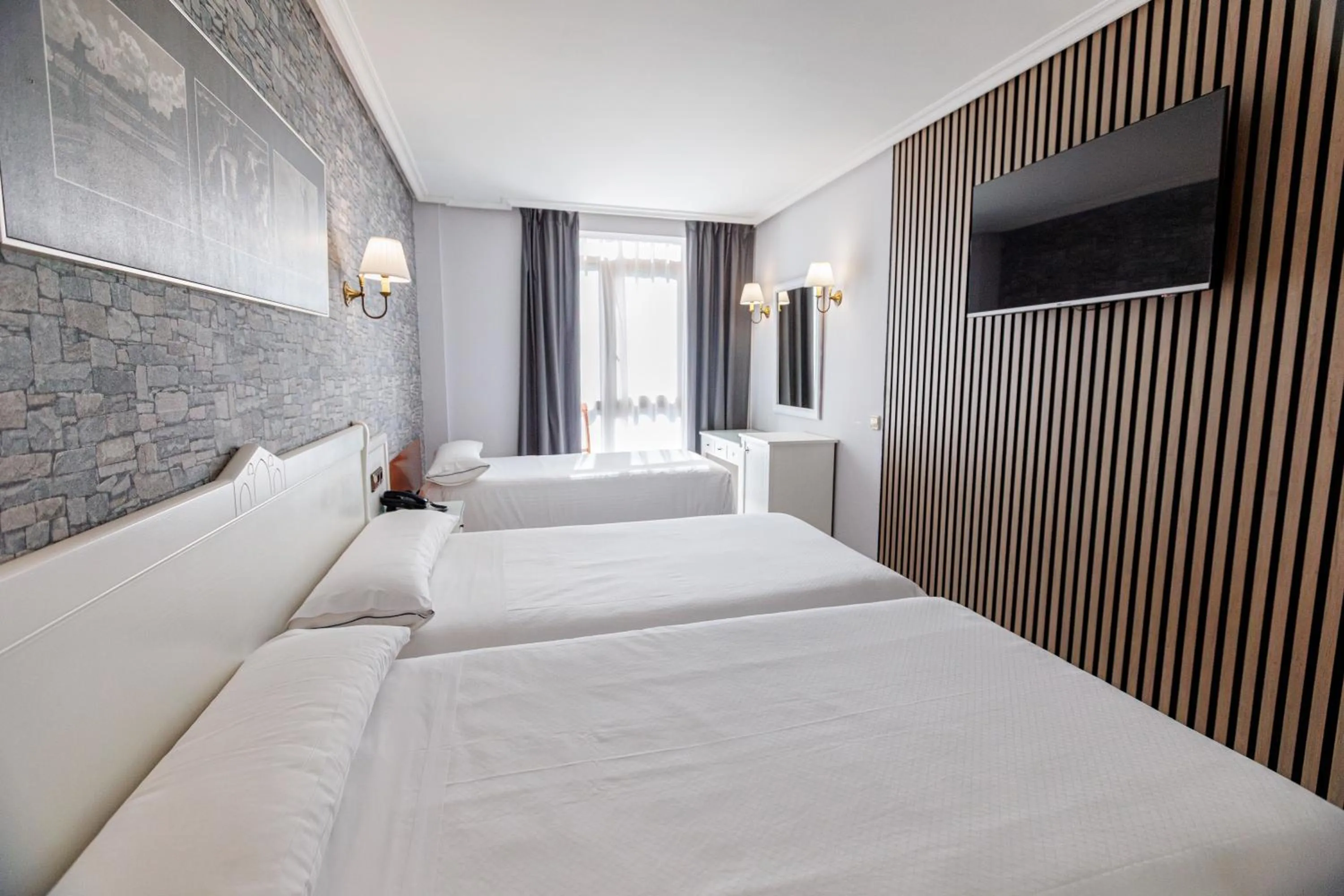 Bed in Hotel Ciudad Cangas de Onis