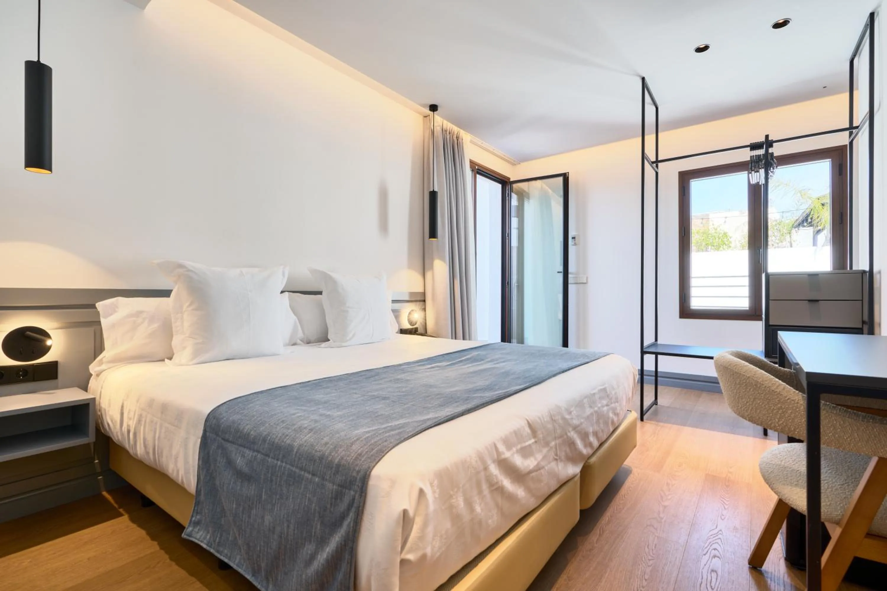 Bed in Hotel Murillo Reinoso