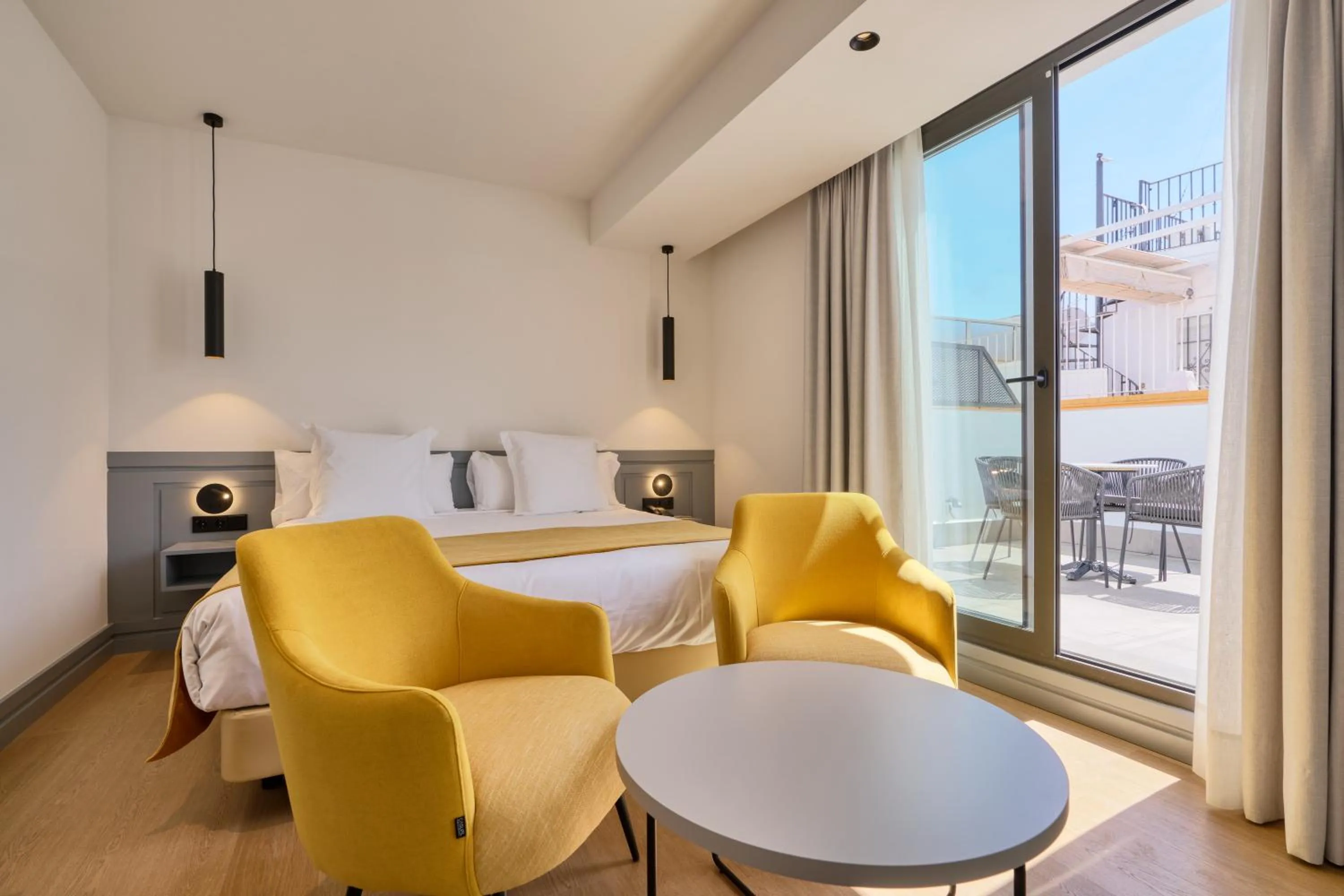 Bed in Hotel Murillo Reinoso