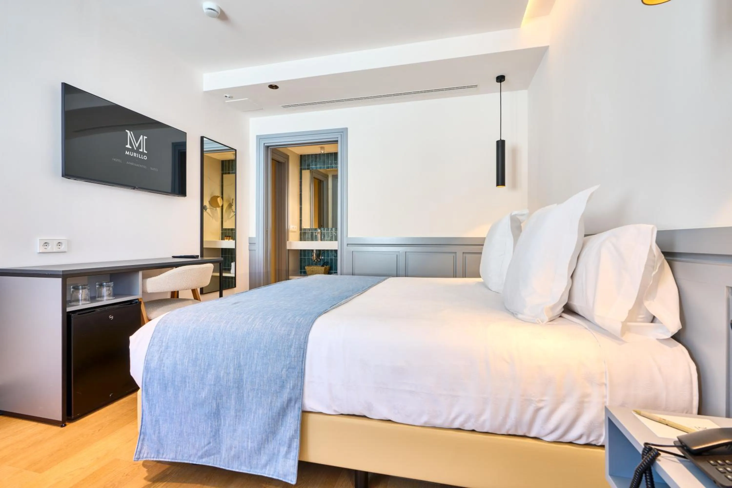 Bed in Hotel Murillo Reinoso