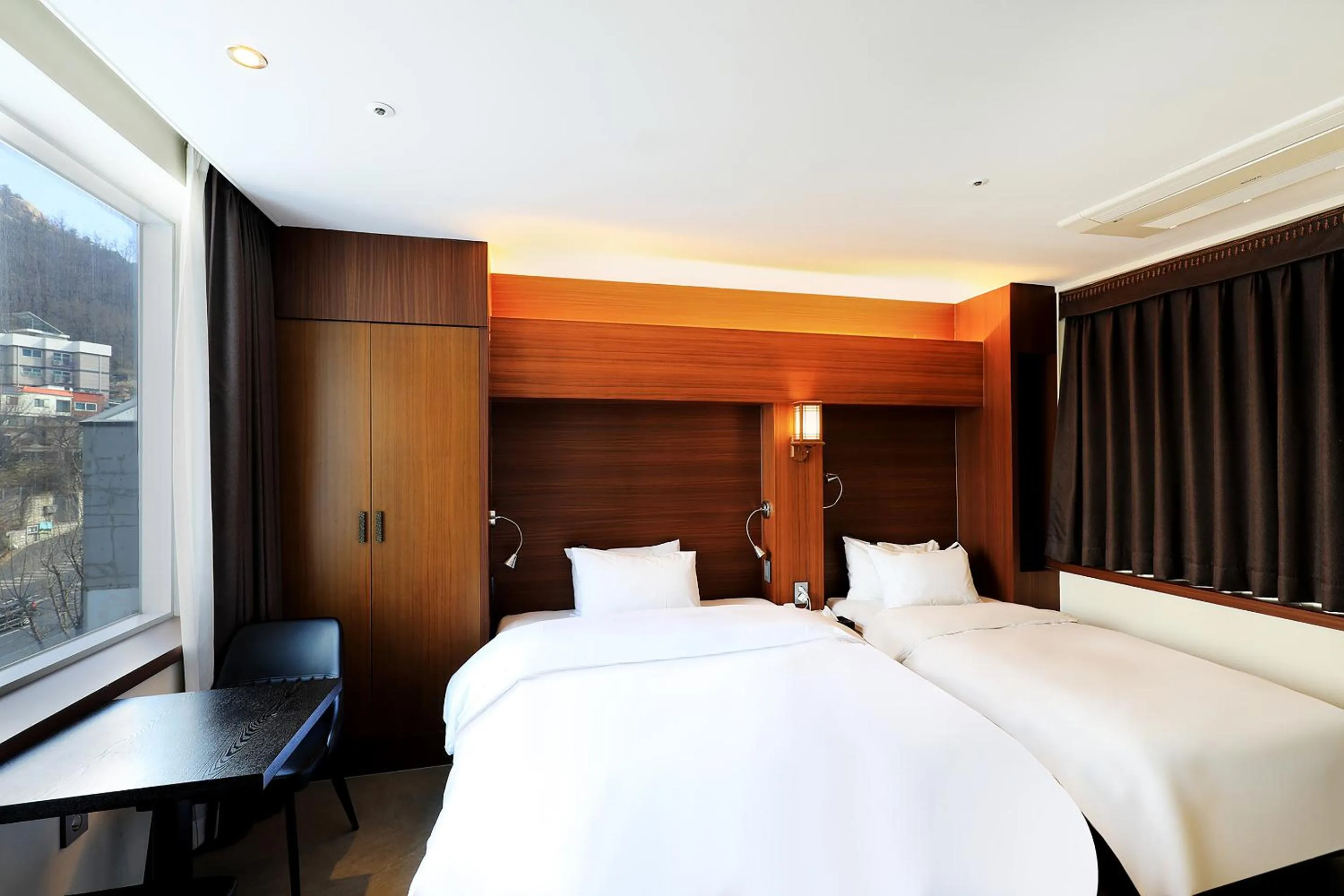 Bed in CS Avenue Tourist Hotel