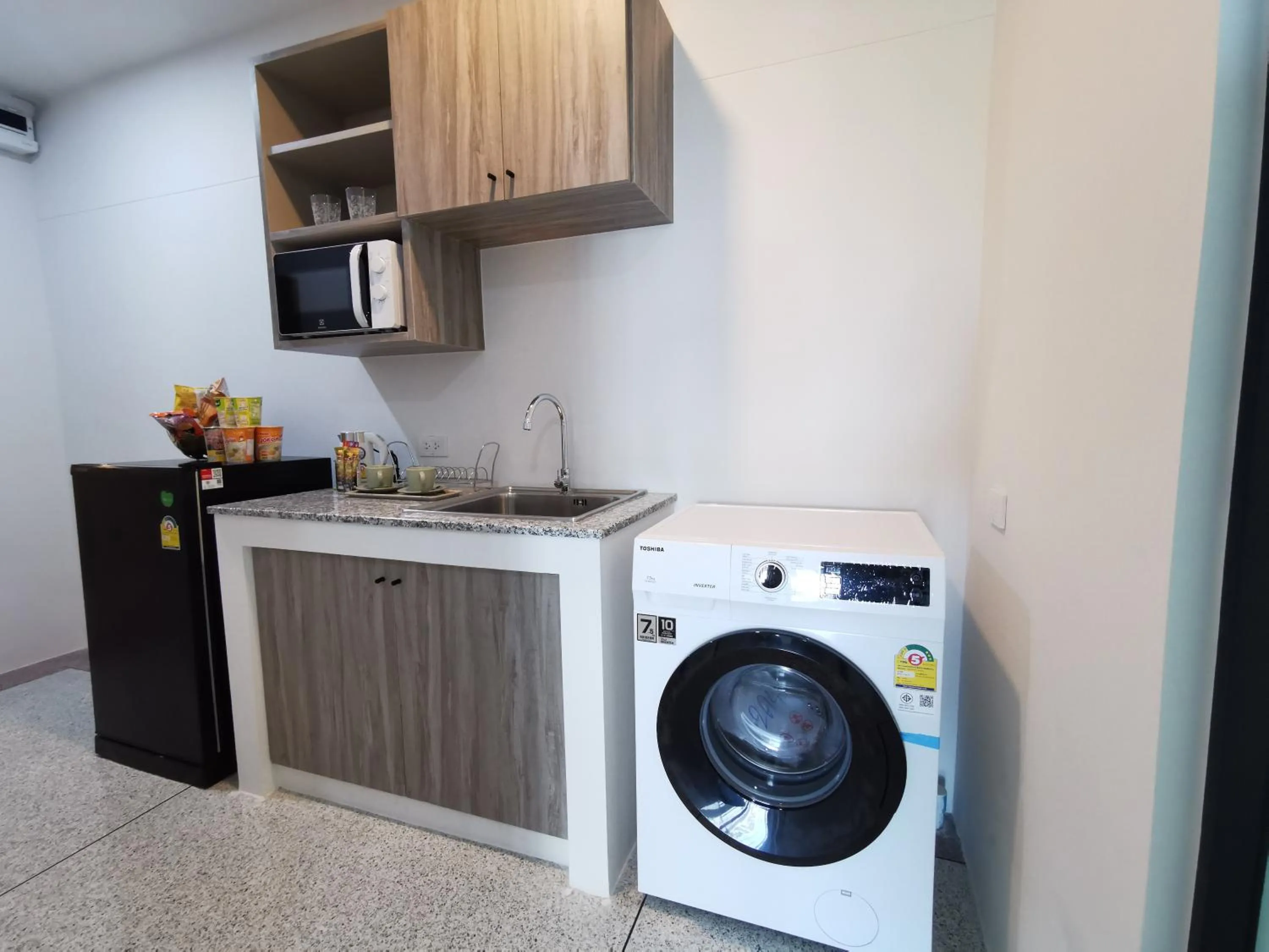 washing machine in ABC@48 Hotel & Service Apartment