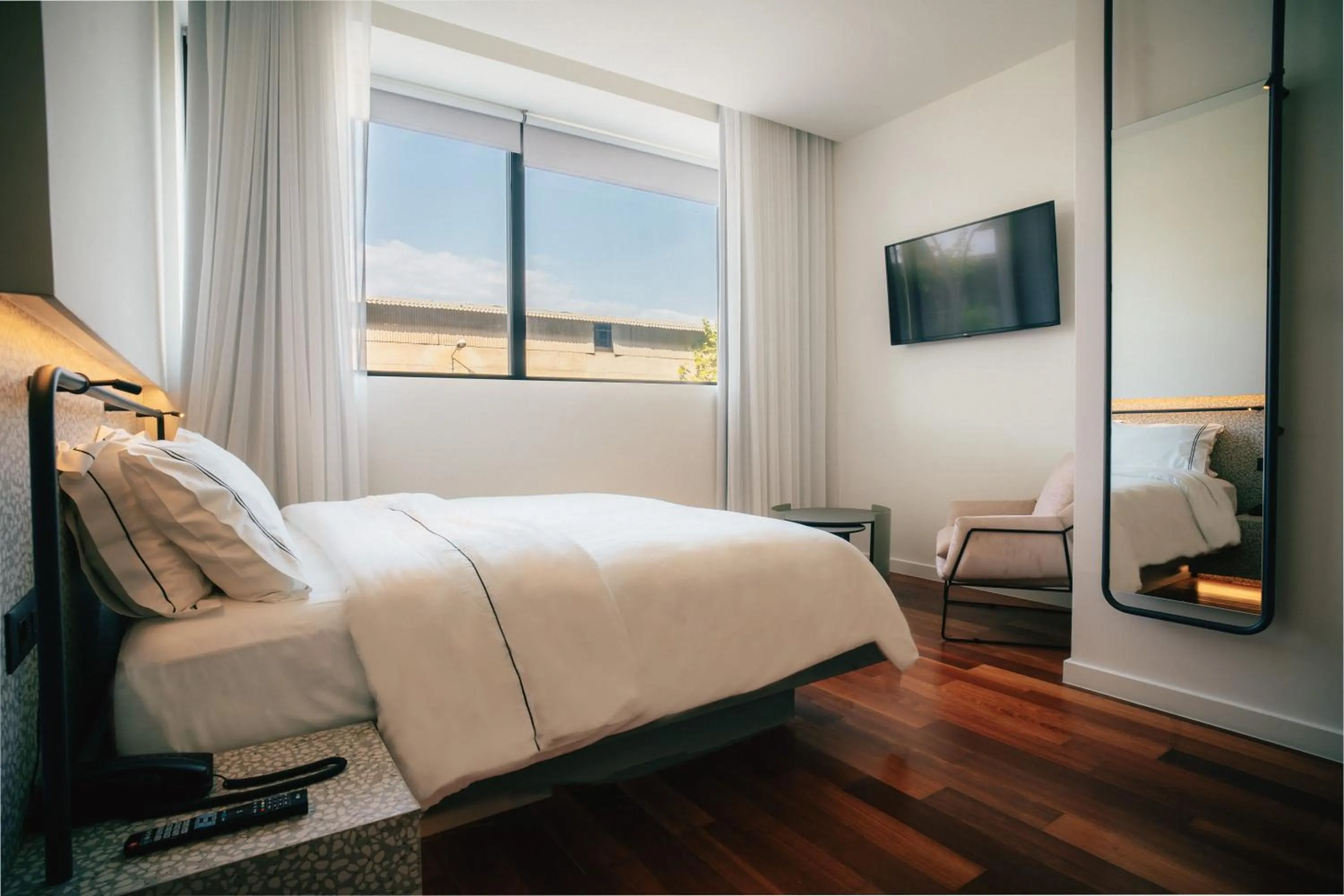 Bed in Amario Suites Hotel