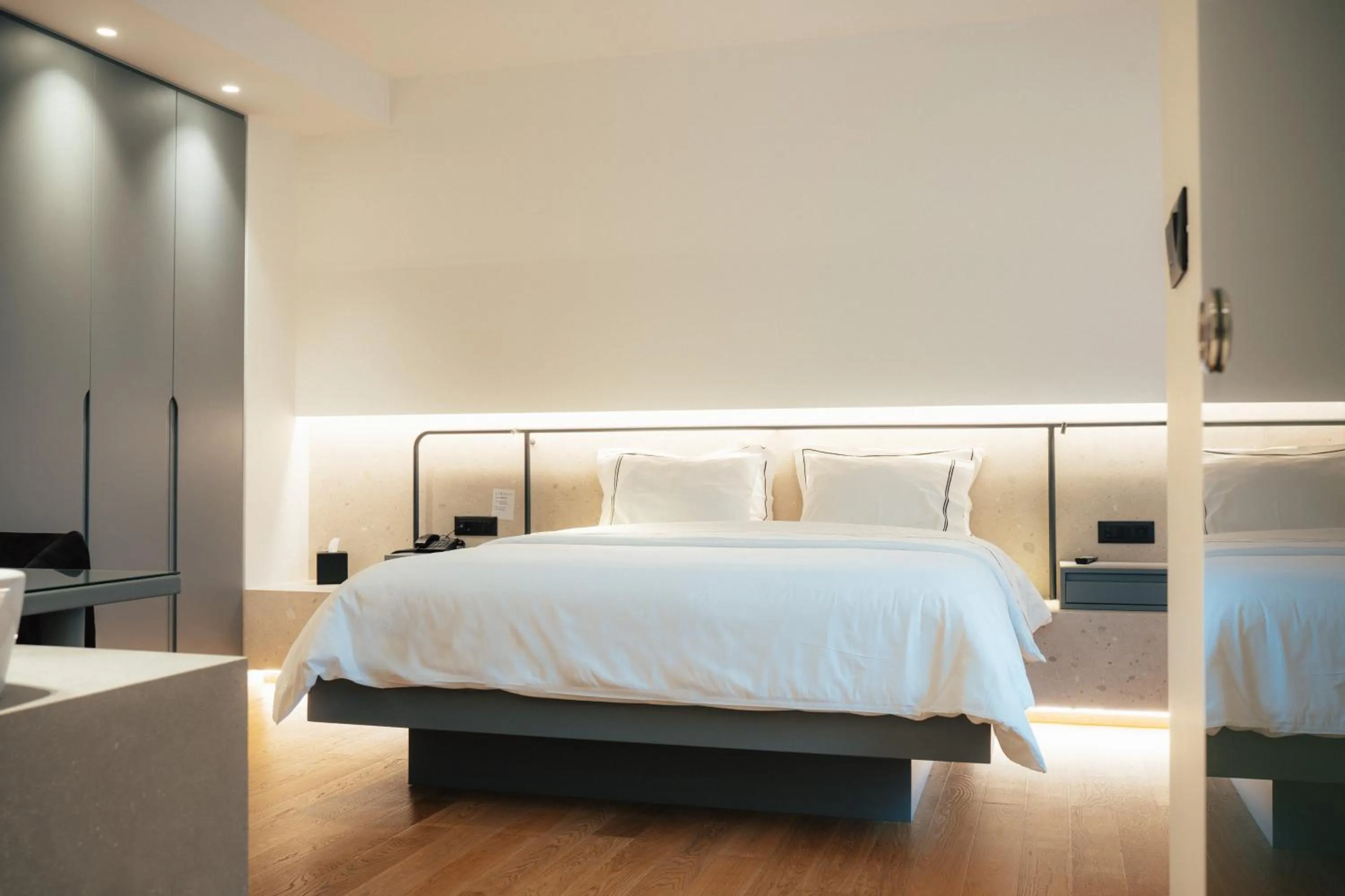 Bed in Amario Suites Hotel