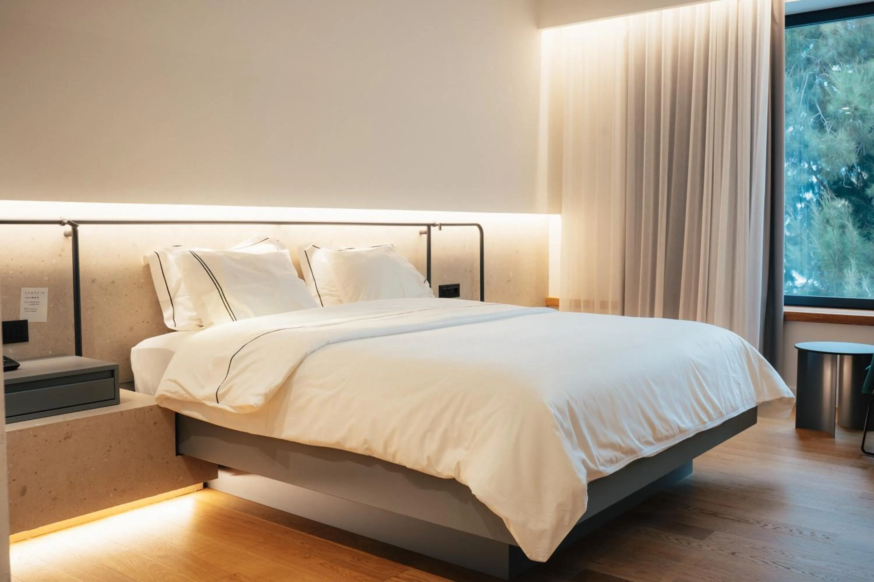 Bed in Amario Suites Hotel