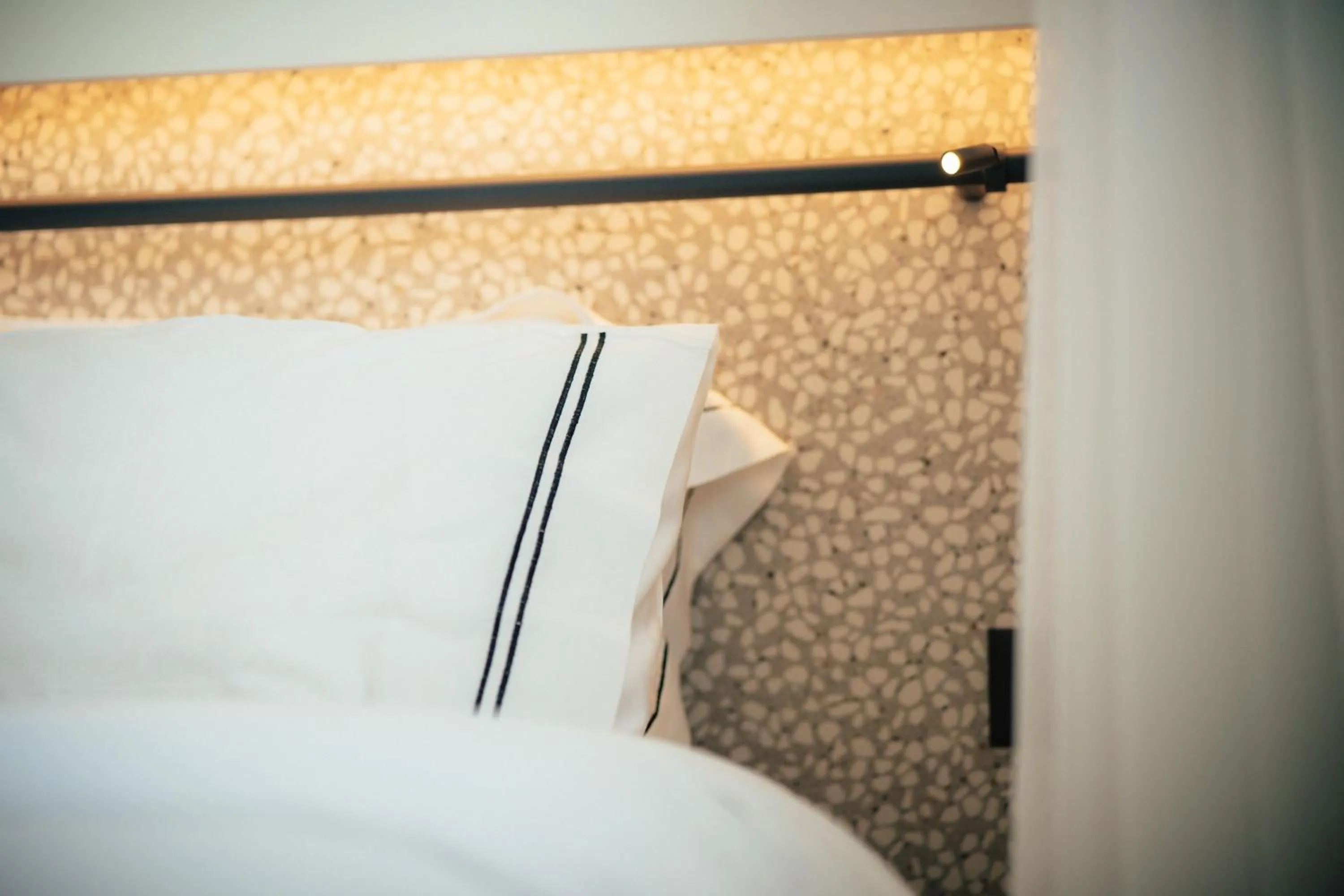 Bed in Amario Suites Hotel