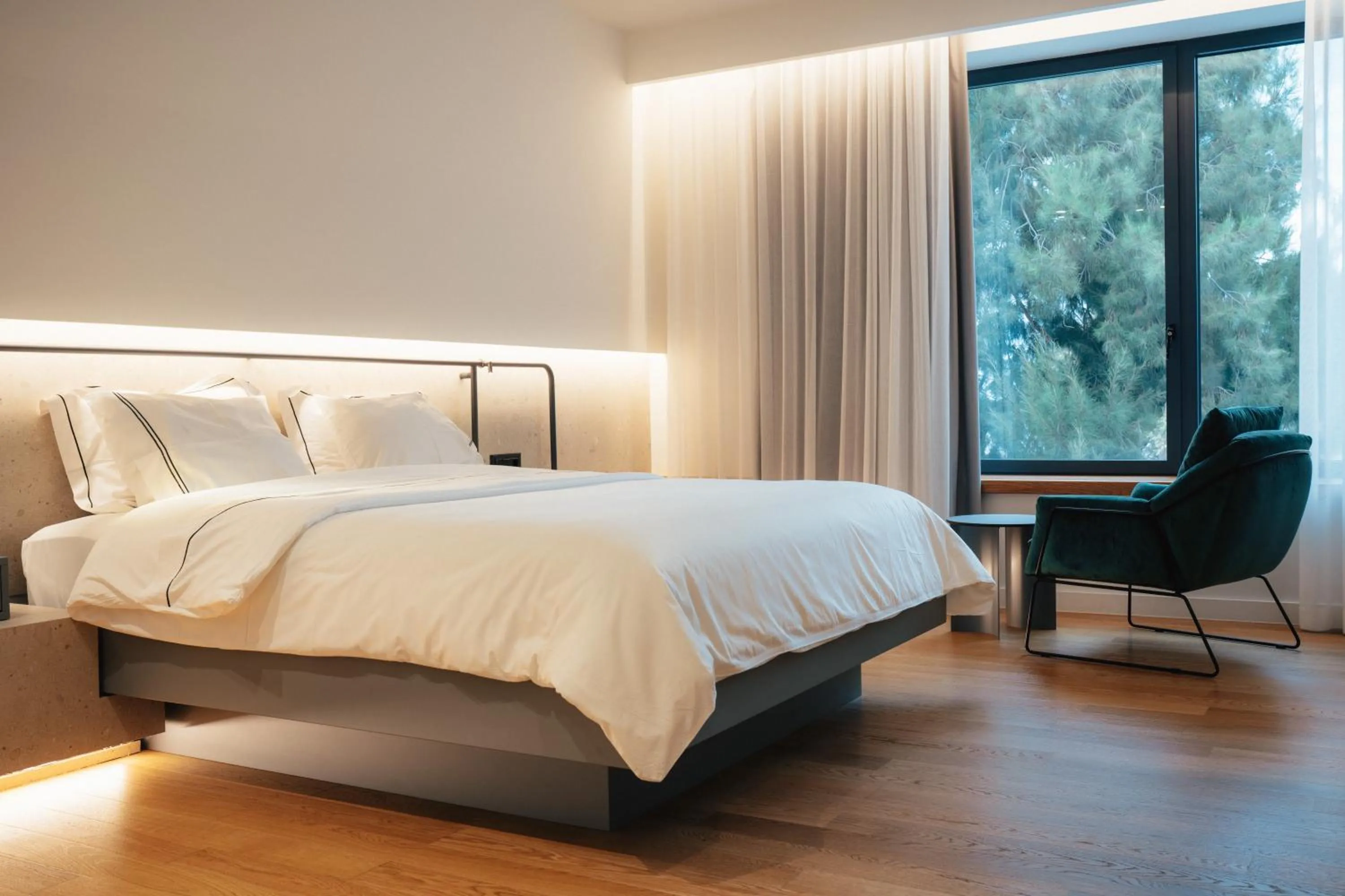 Bed in Amario Suites Hotel