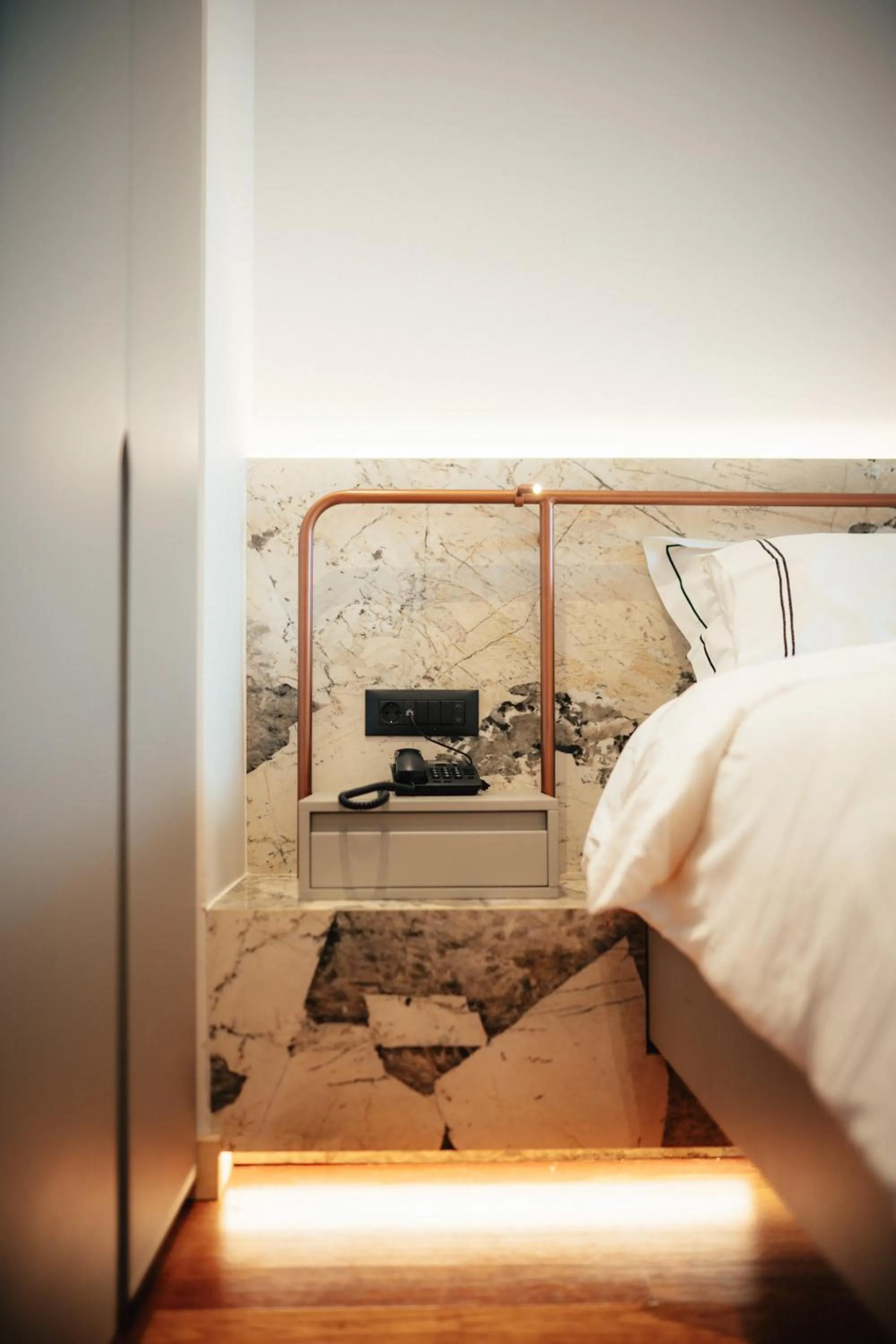 Bed in Amario Suites Hotel