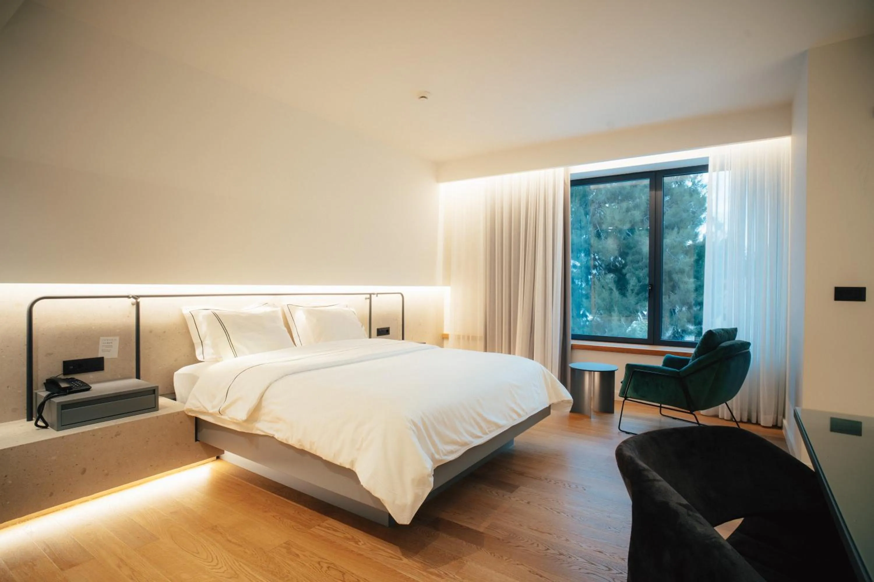 Bed in Amario Suites Hotel