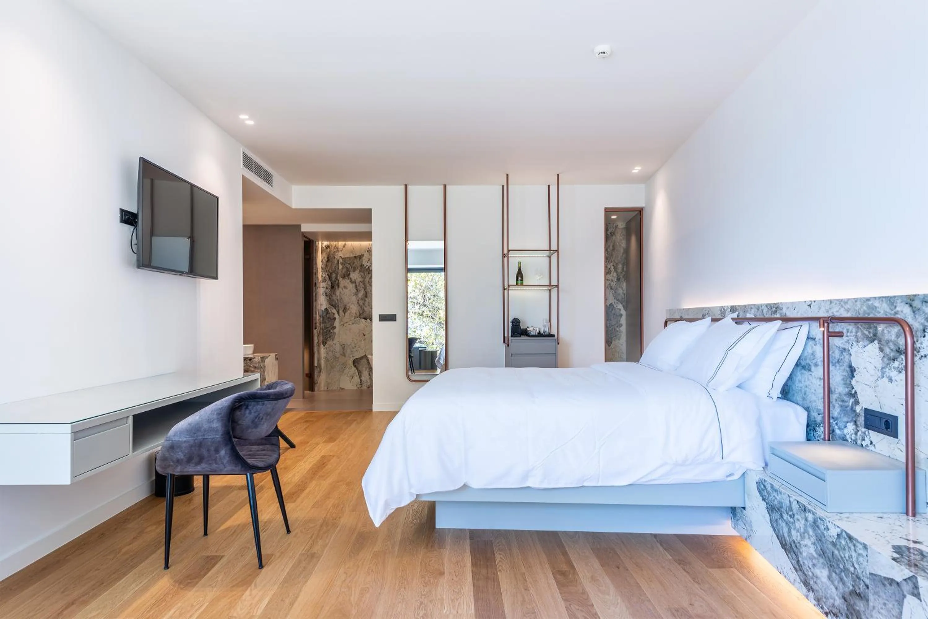 Bed in Amario Suites Hotel