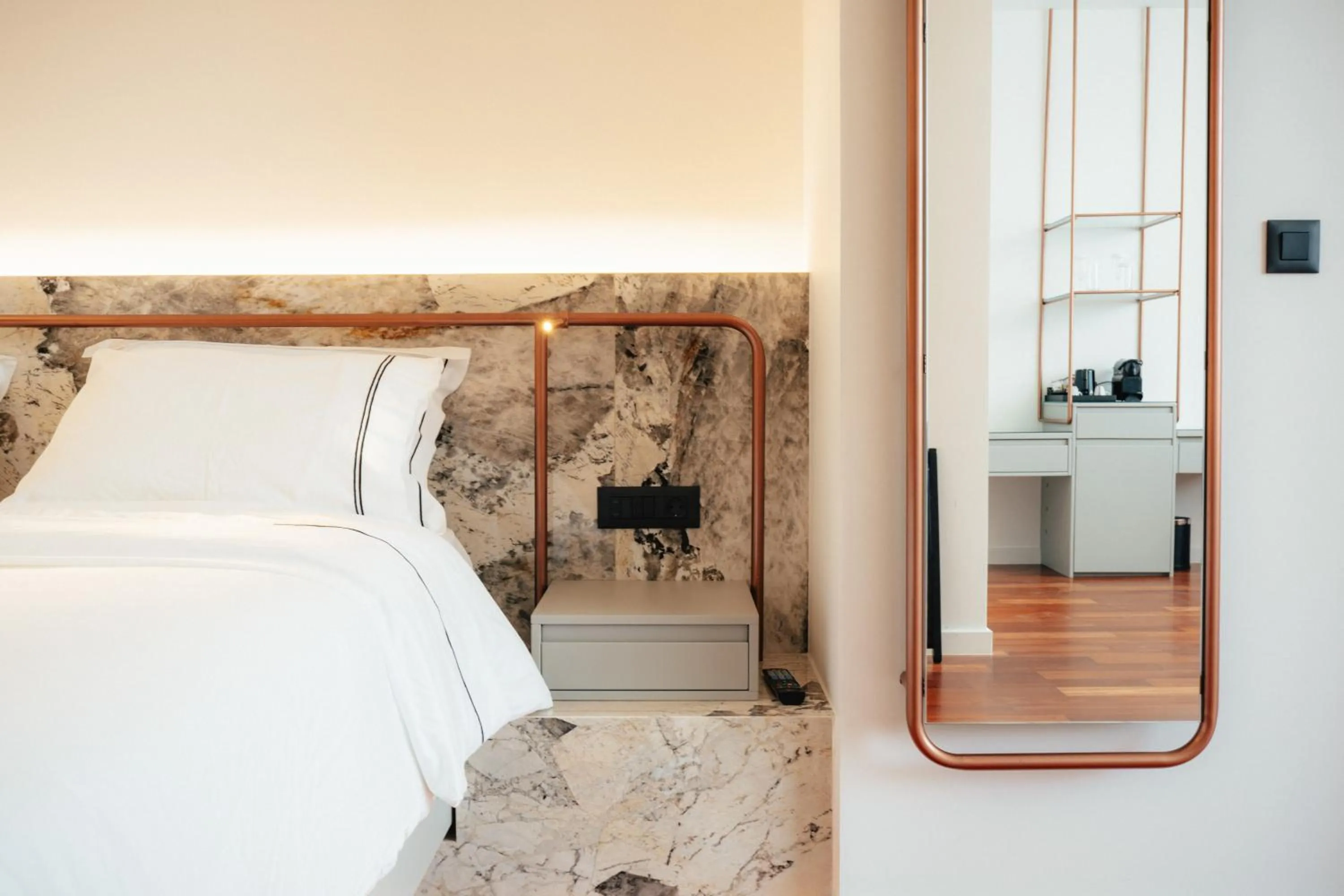 Bed in Amario Suites Hotel