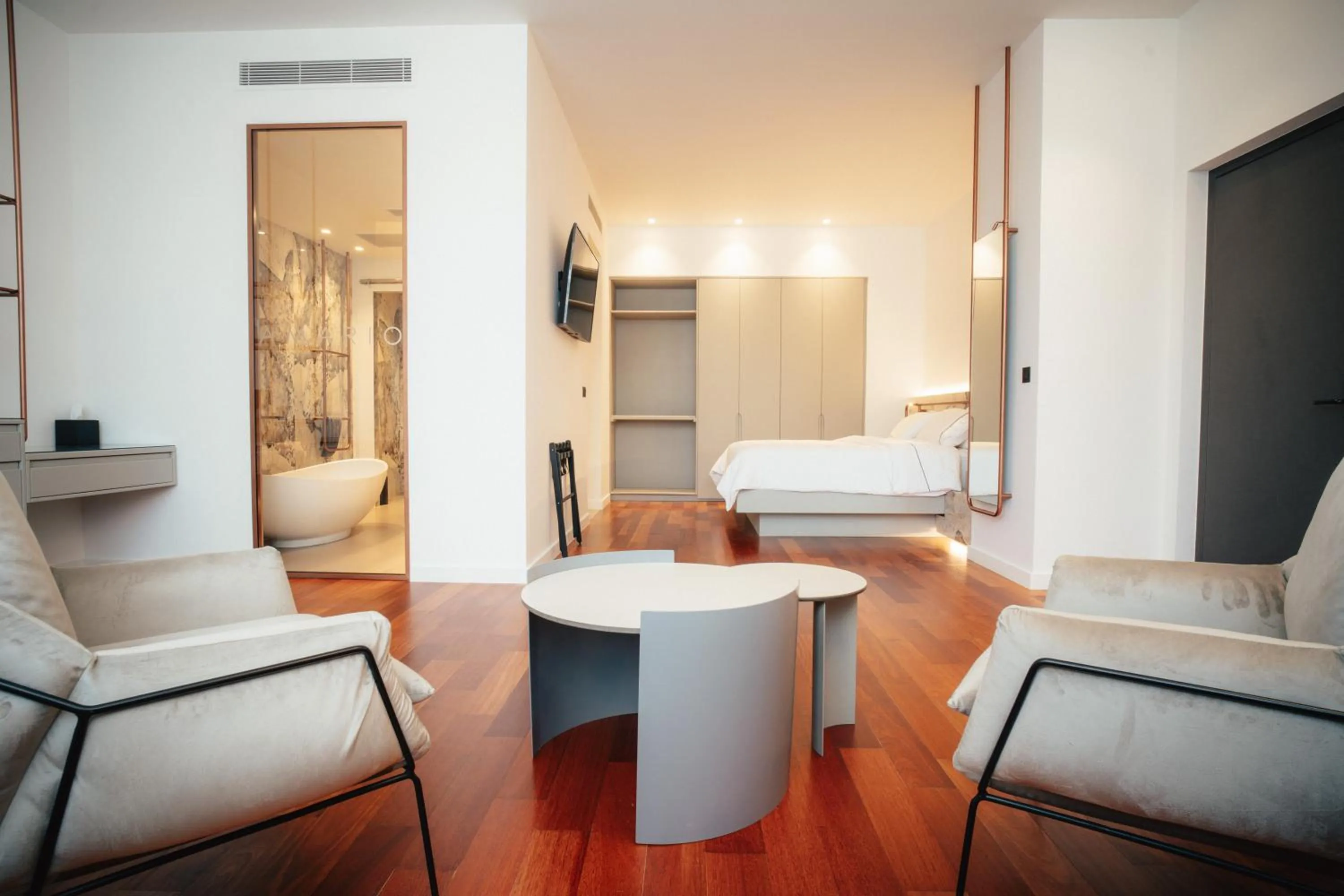 Bed in Amario Suites Hotel