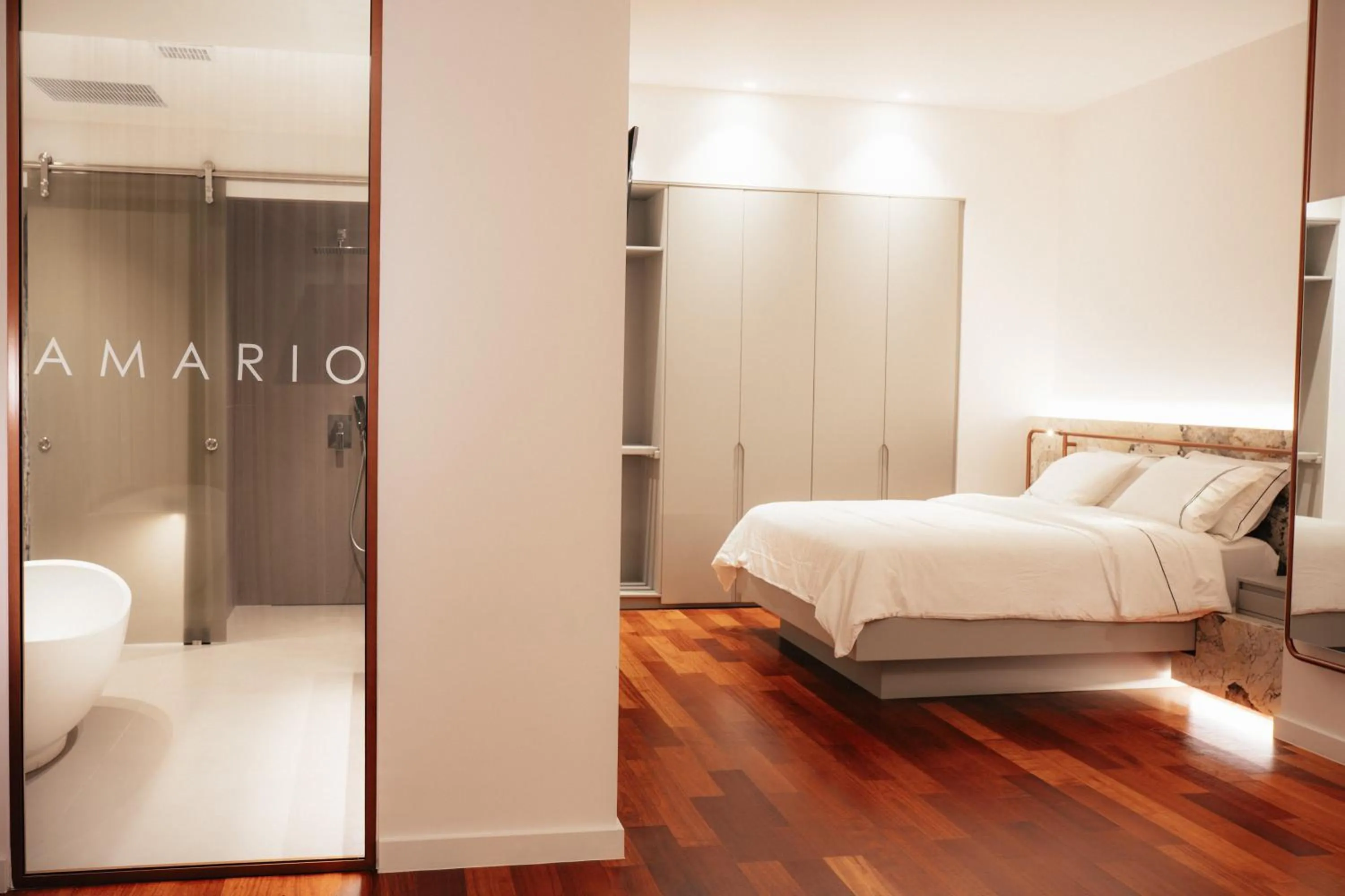 Bed in Amario Suites Hotel