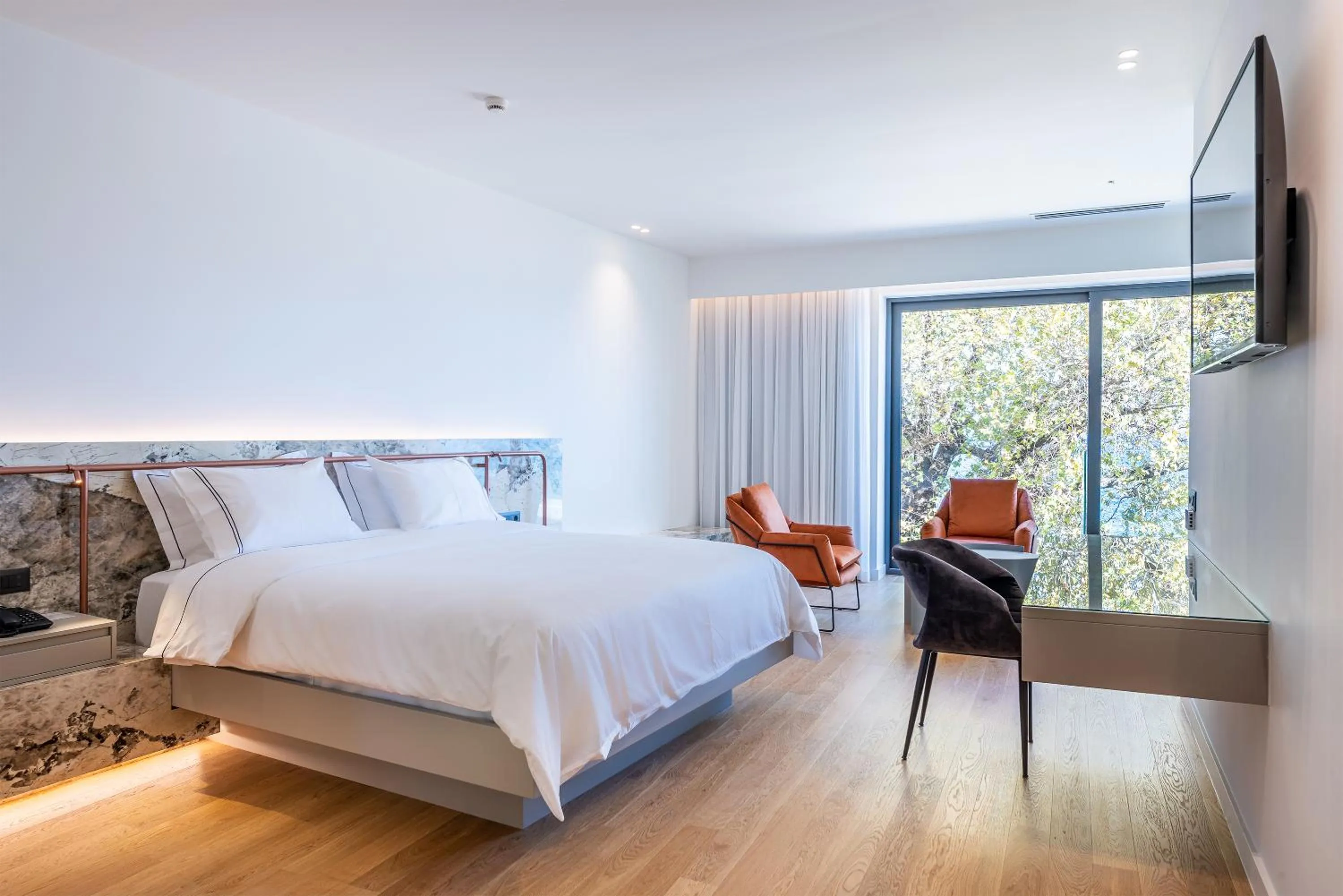 Bed in Amario Suites Hotel