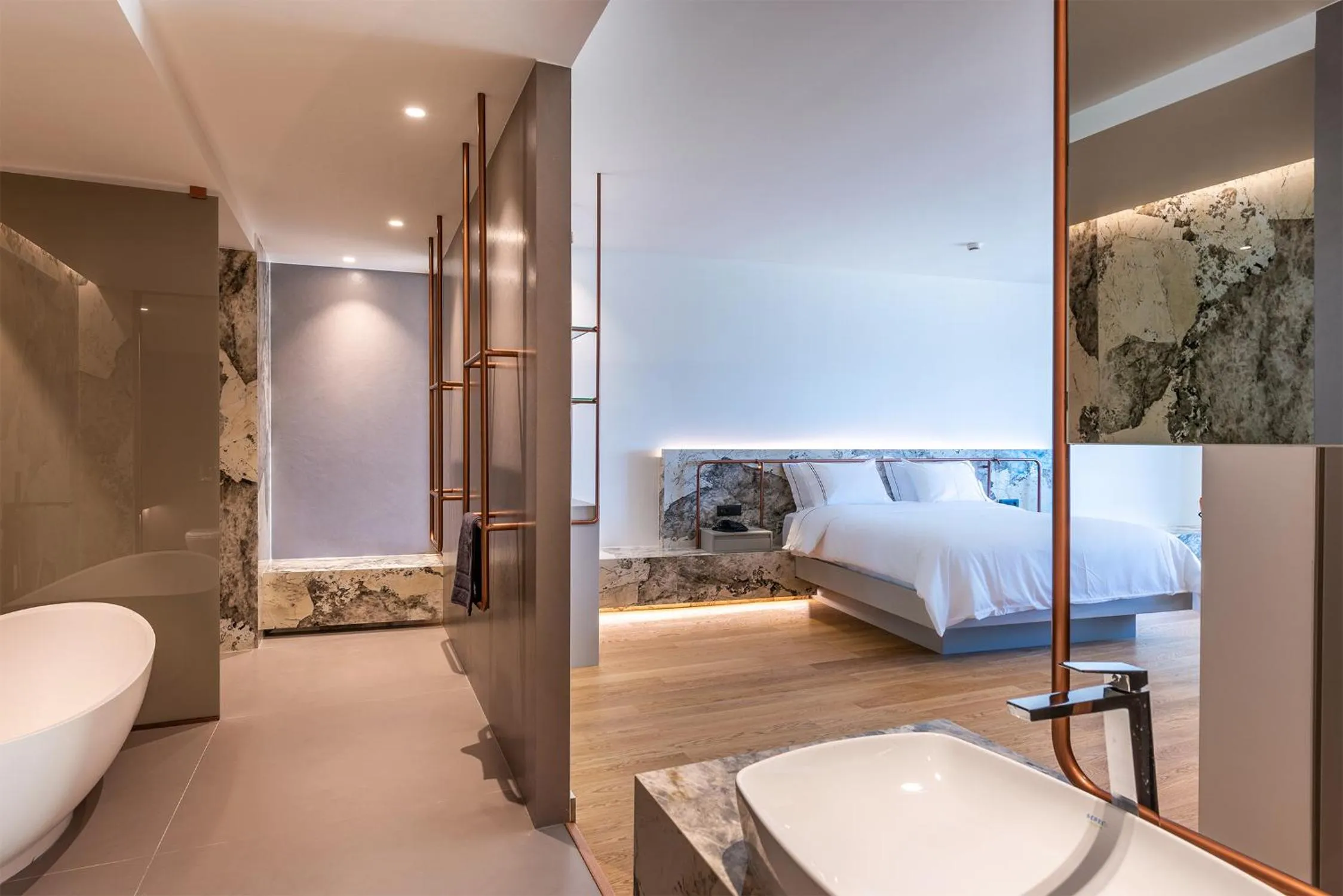 Bed in Amario Suites Hotel