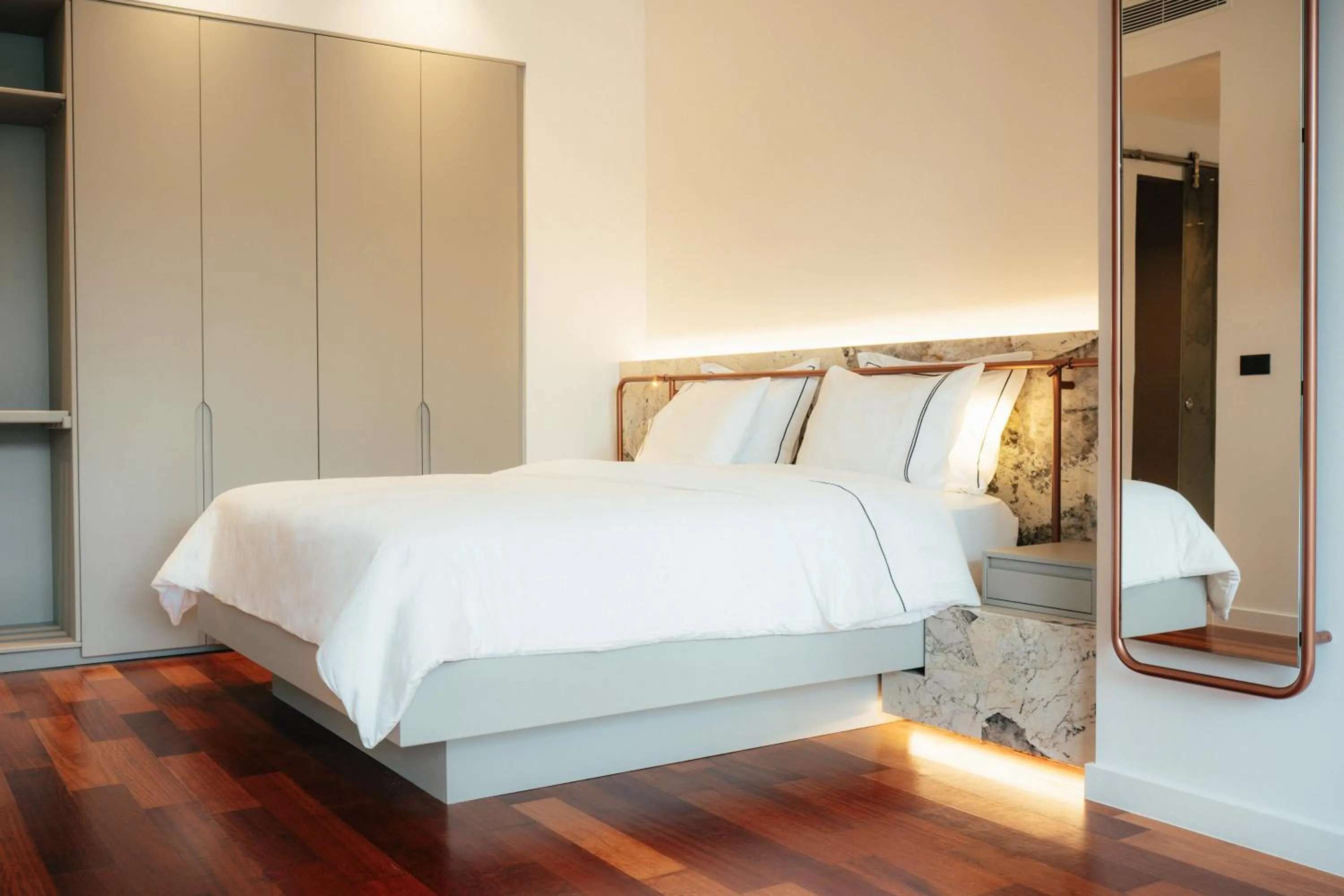 Bed in Amario Suites Hotel