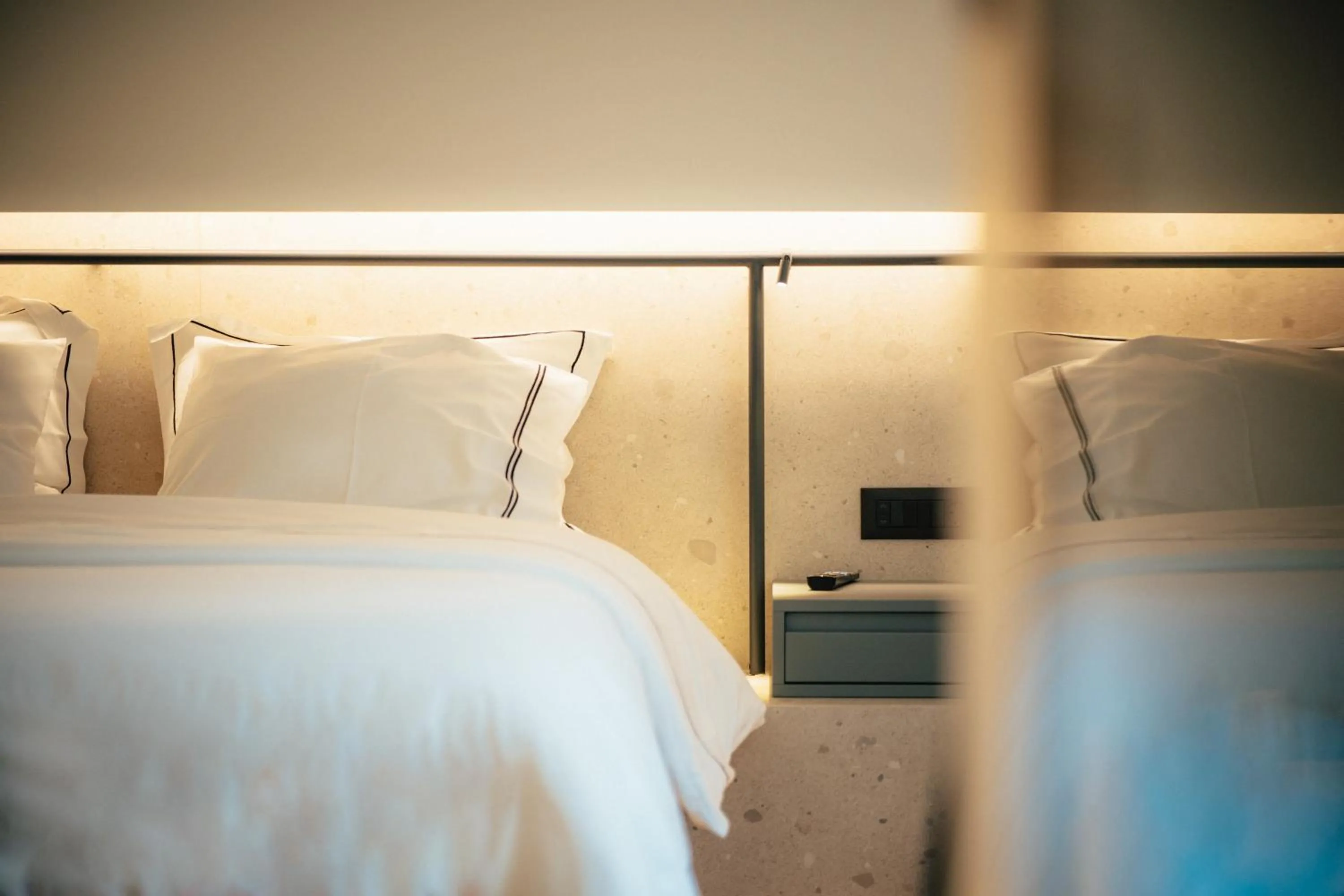 Bed in Amario Suites Hotel