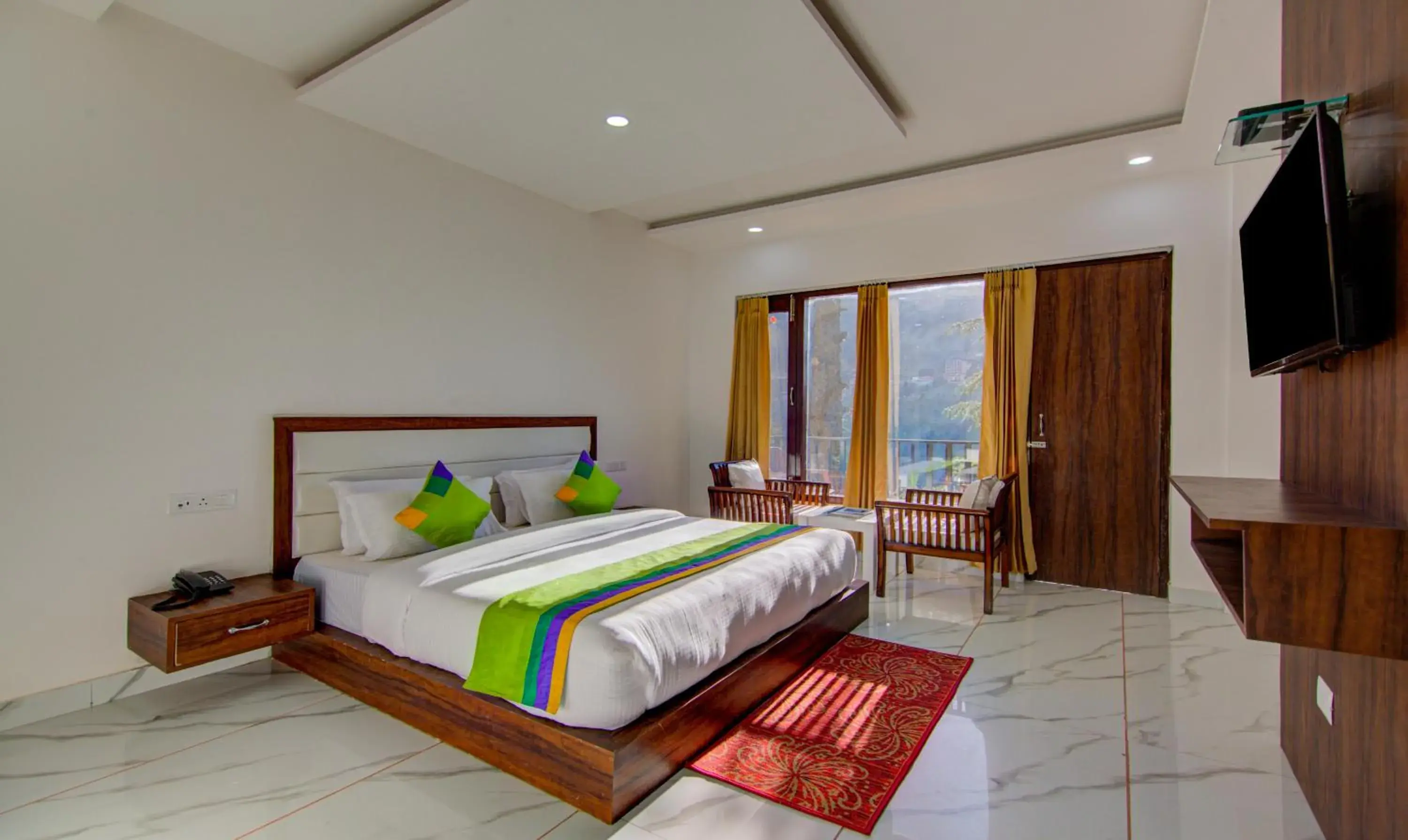 Photo of the whole room, Bed in Treebo Trend Down Town Photo of the whole room, Bed in Treebo Trend Down Town