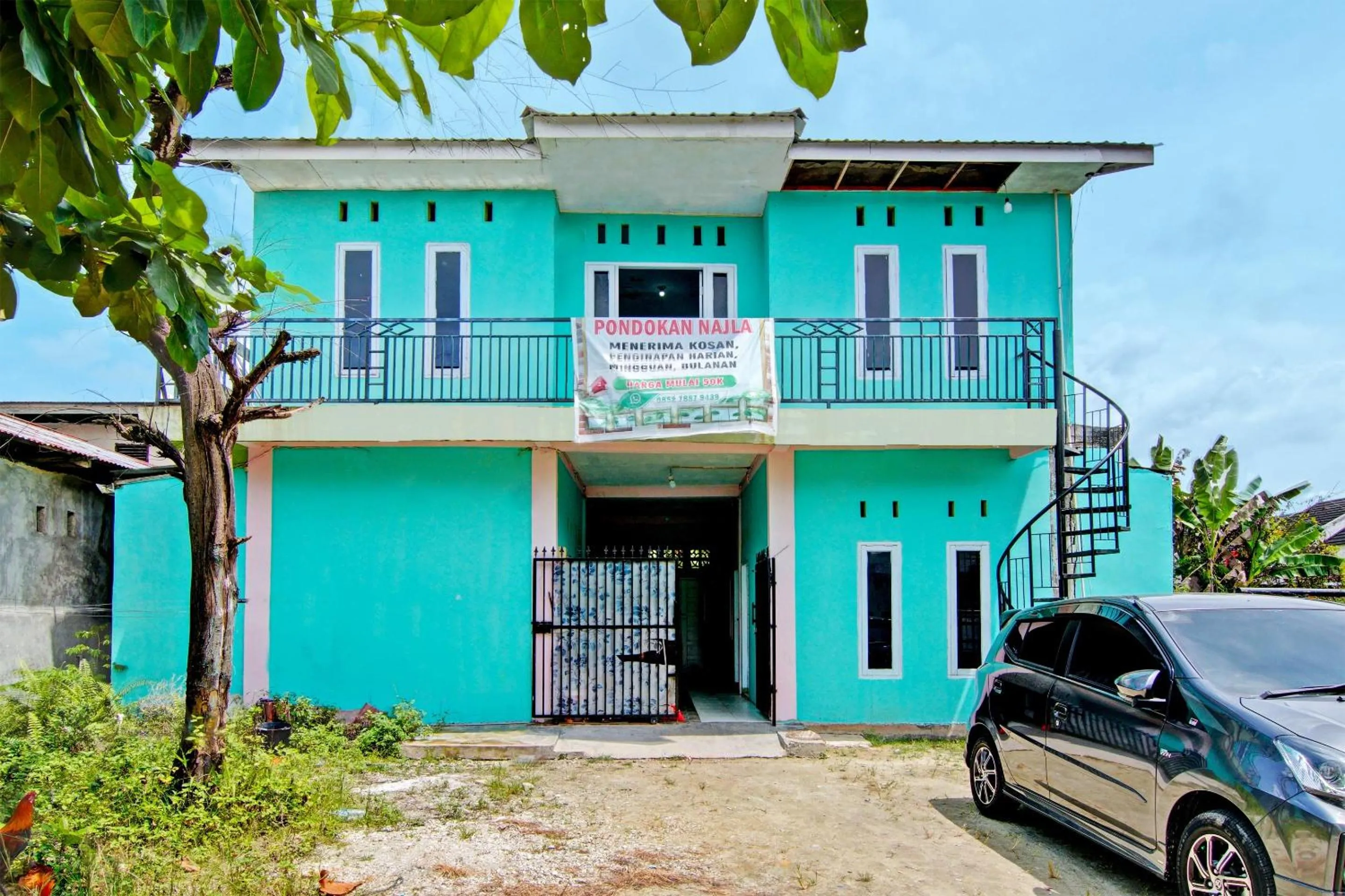 Facade/entrance in SPOT ON 91918 Najla Guest House Syariah